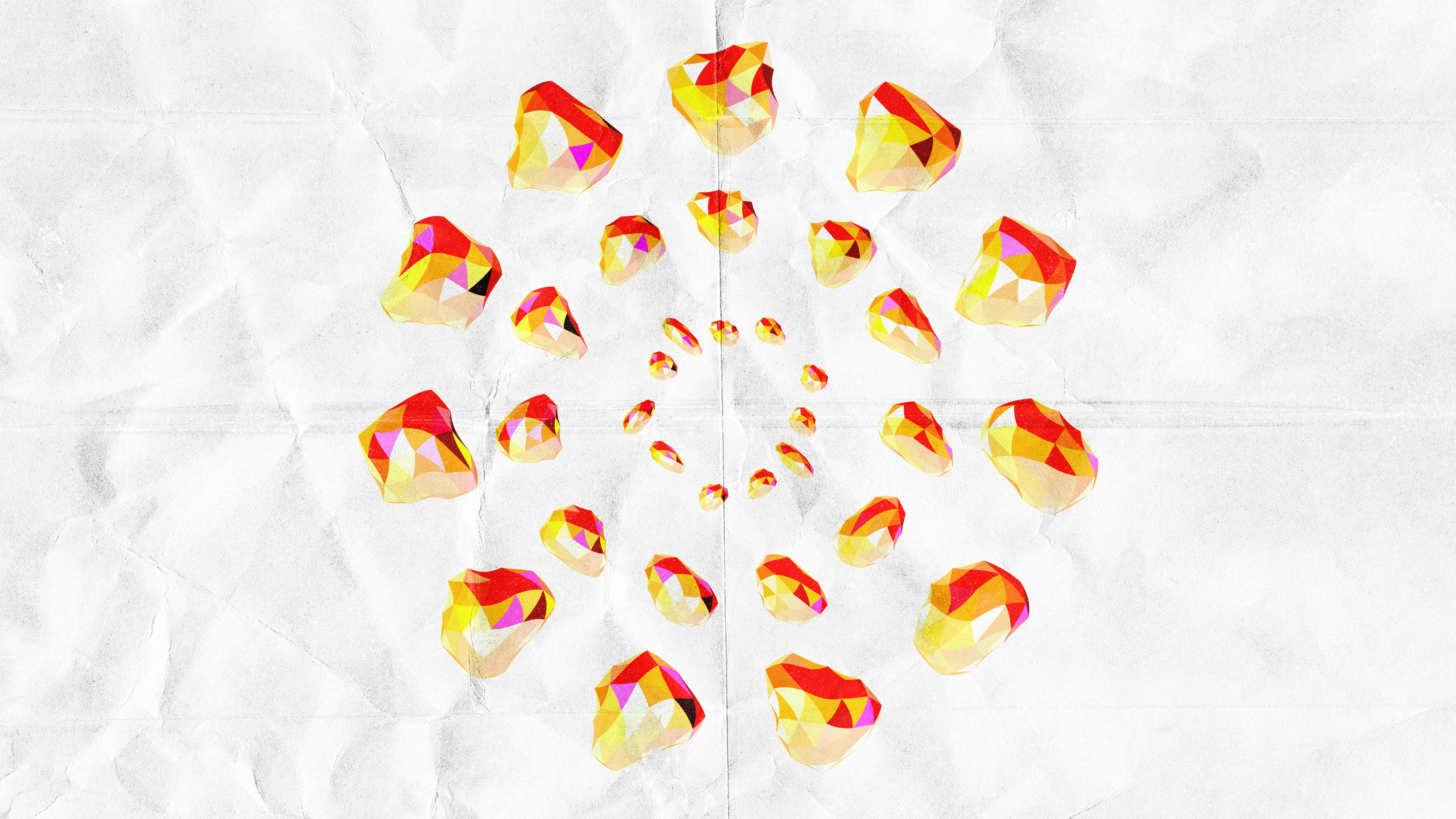 Garnet seeds arranged in a spiral pattern