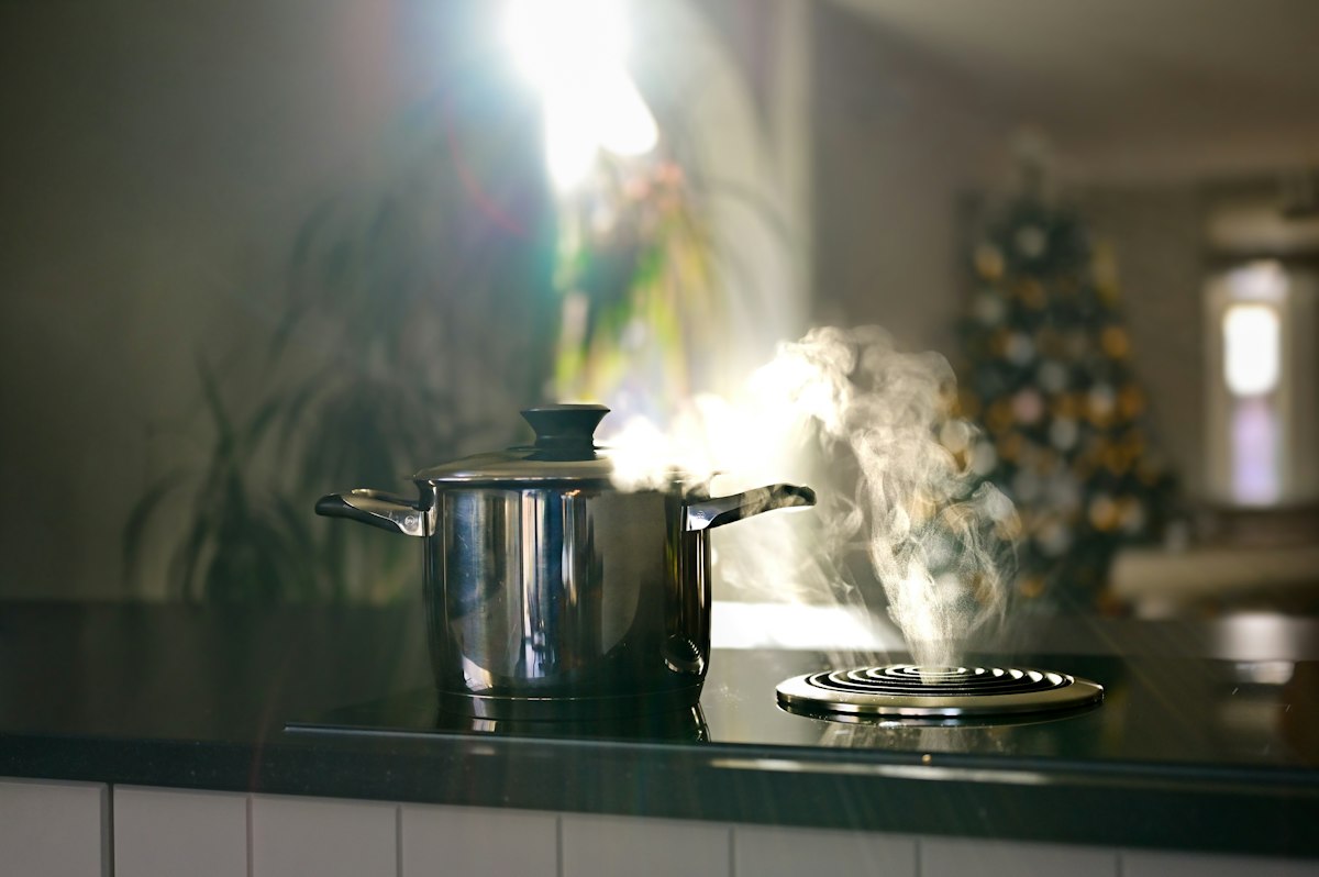 Steaming pot on a stovetop