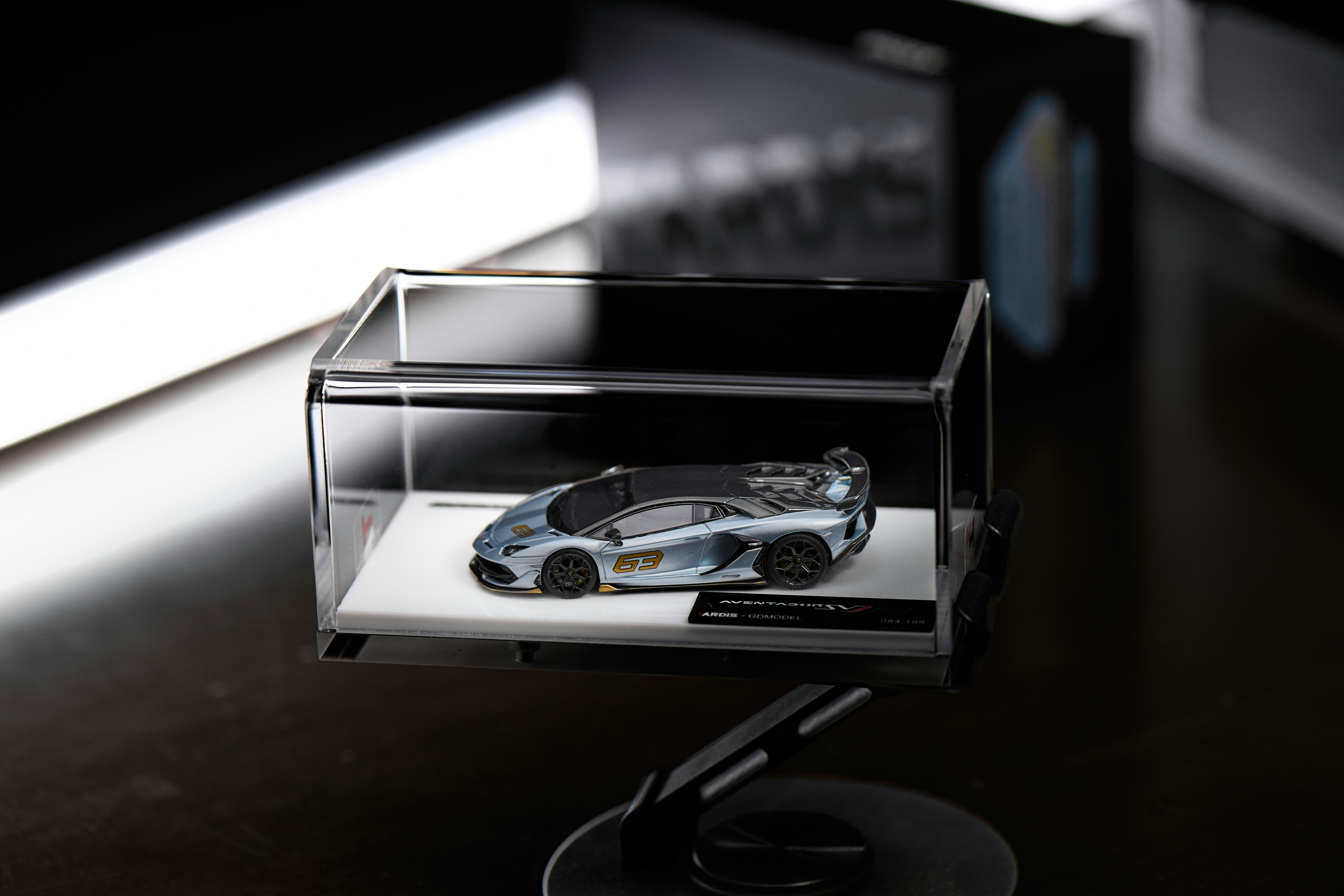 Model car displayed in a clear case