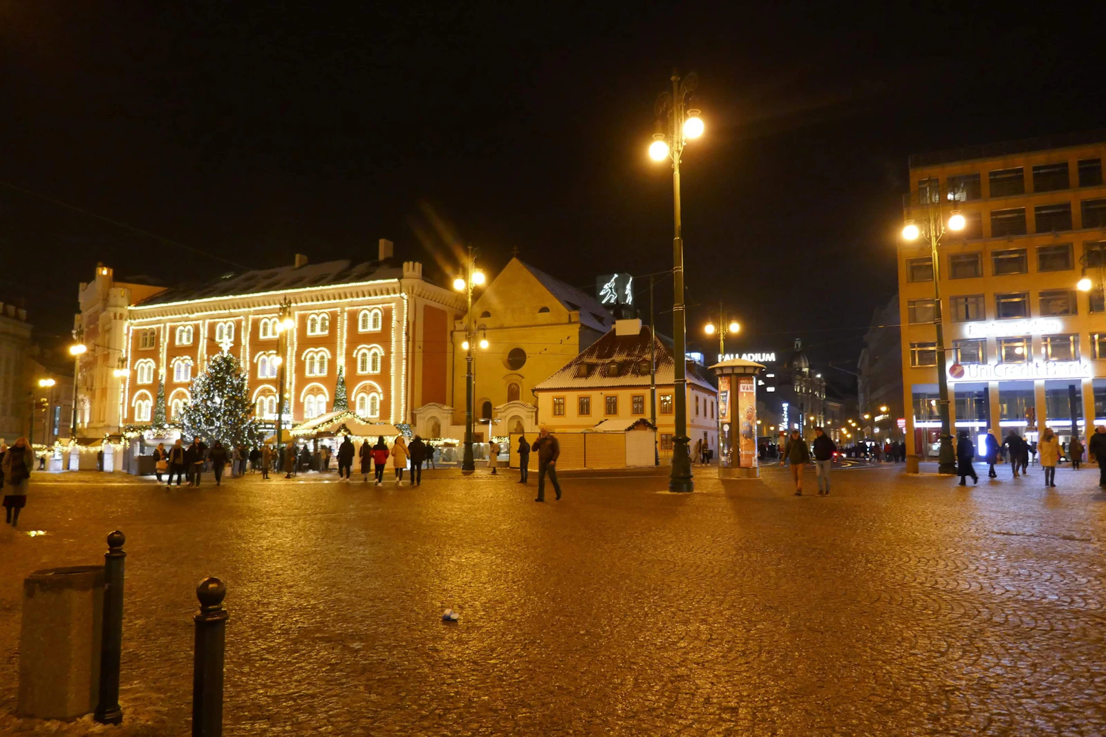 City square at night with christmas tree and lights
