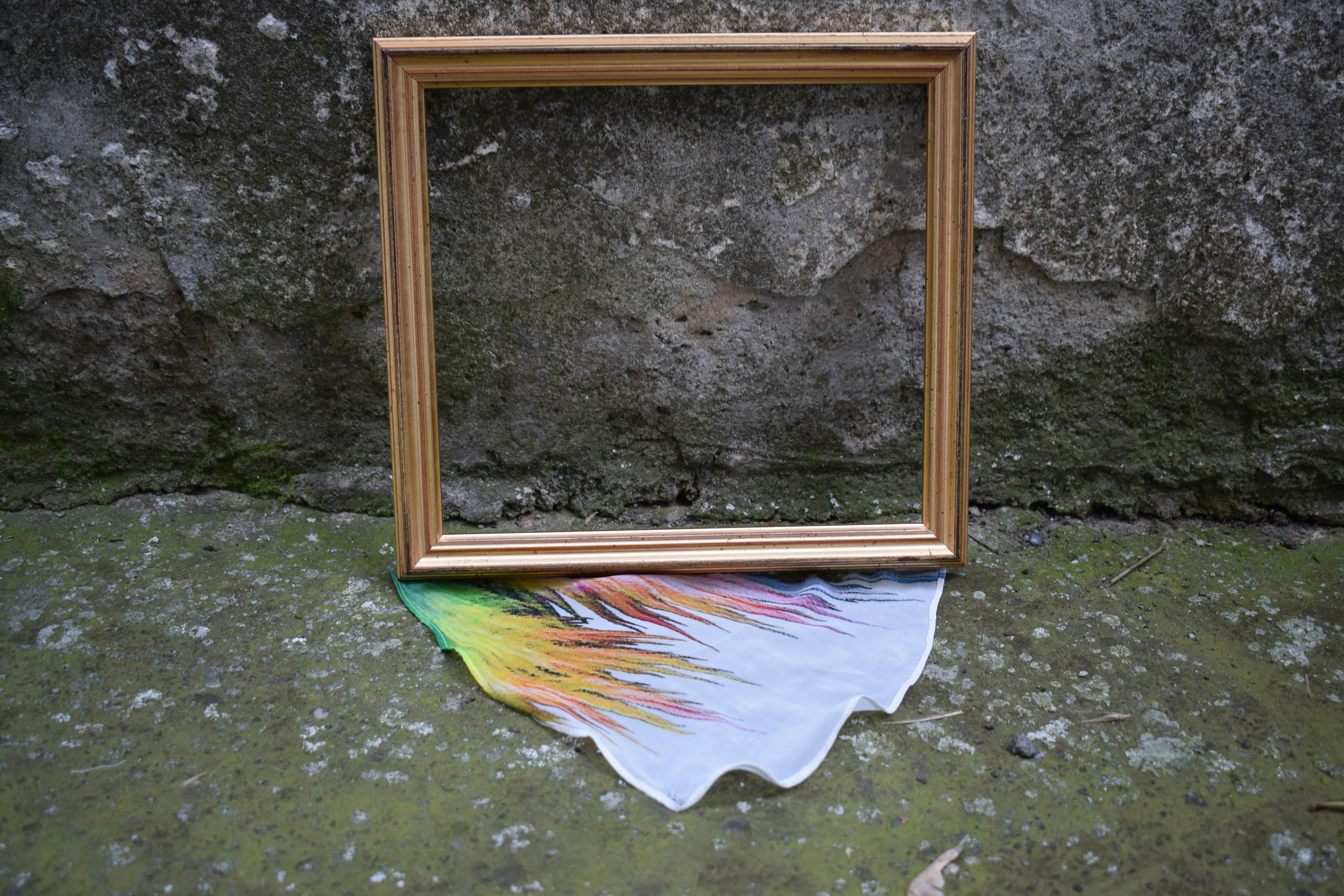 Securing canvas in frame