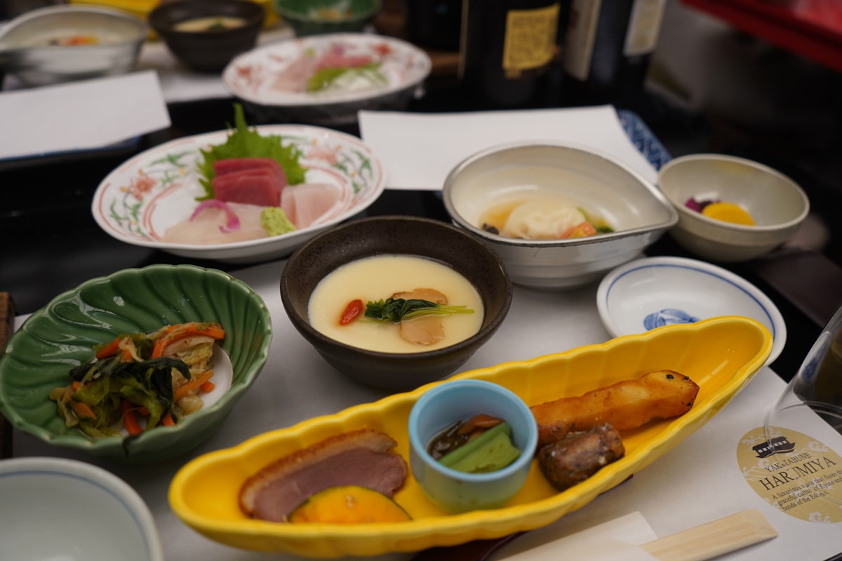 A beautifully presented kaiseki multi-course Japanese meal — exquisite small dishes arranged with artistry