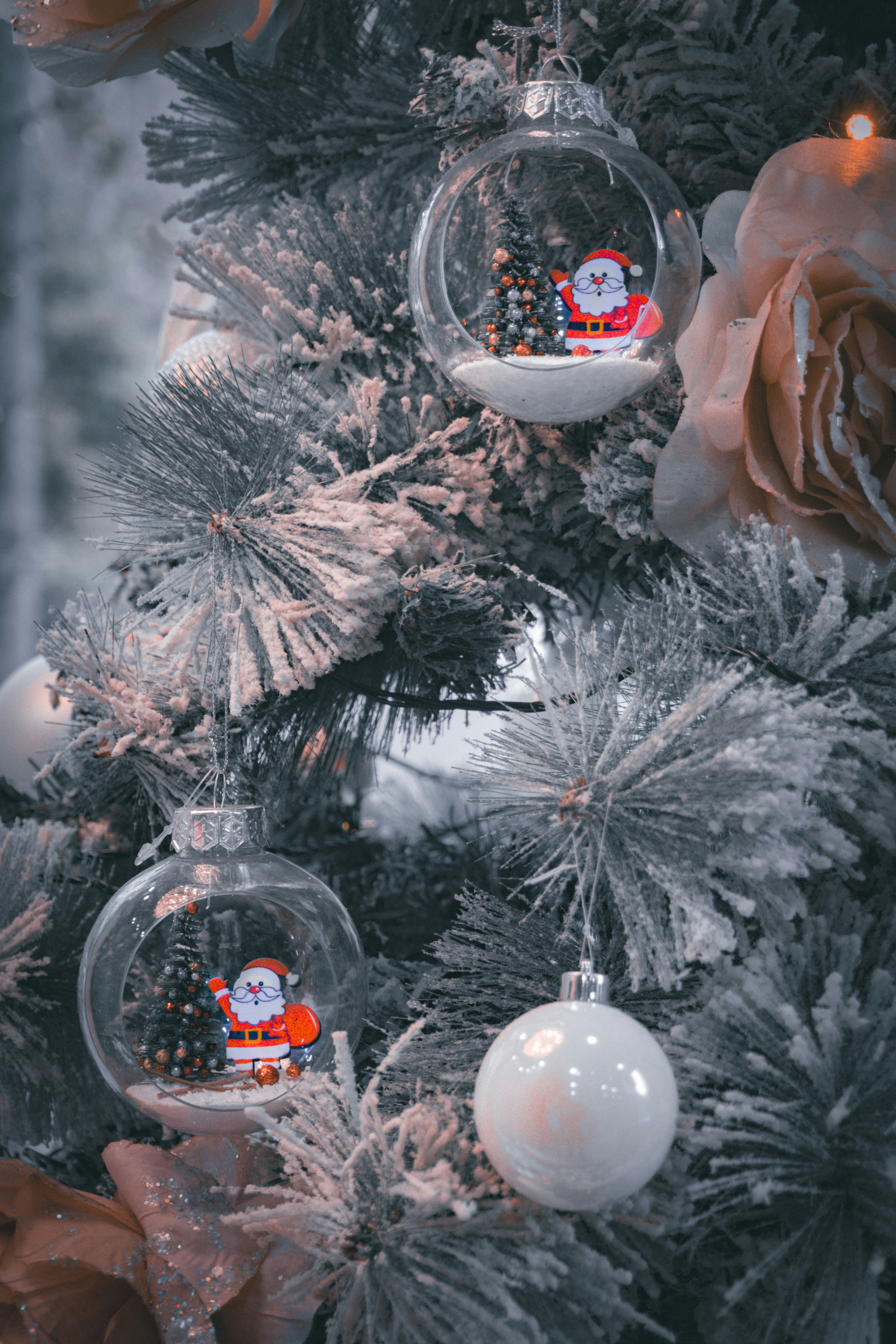 Christmas tree ornaments with santa claus figures