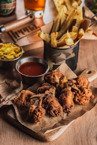 Fried chicken wings with french fries and dipping sauce