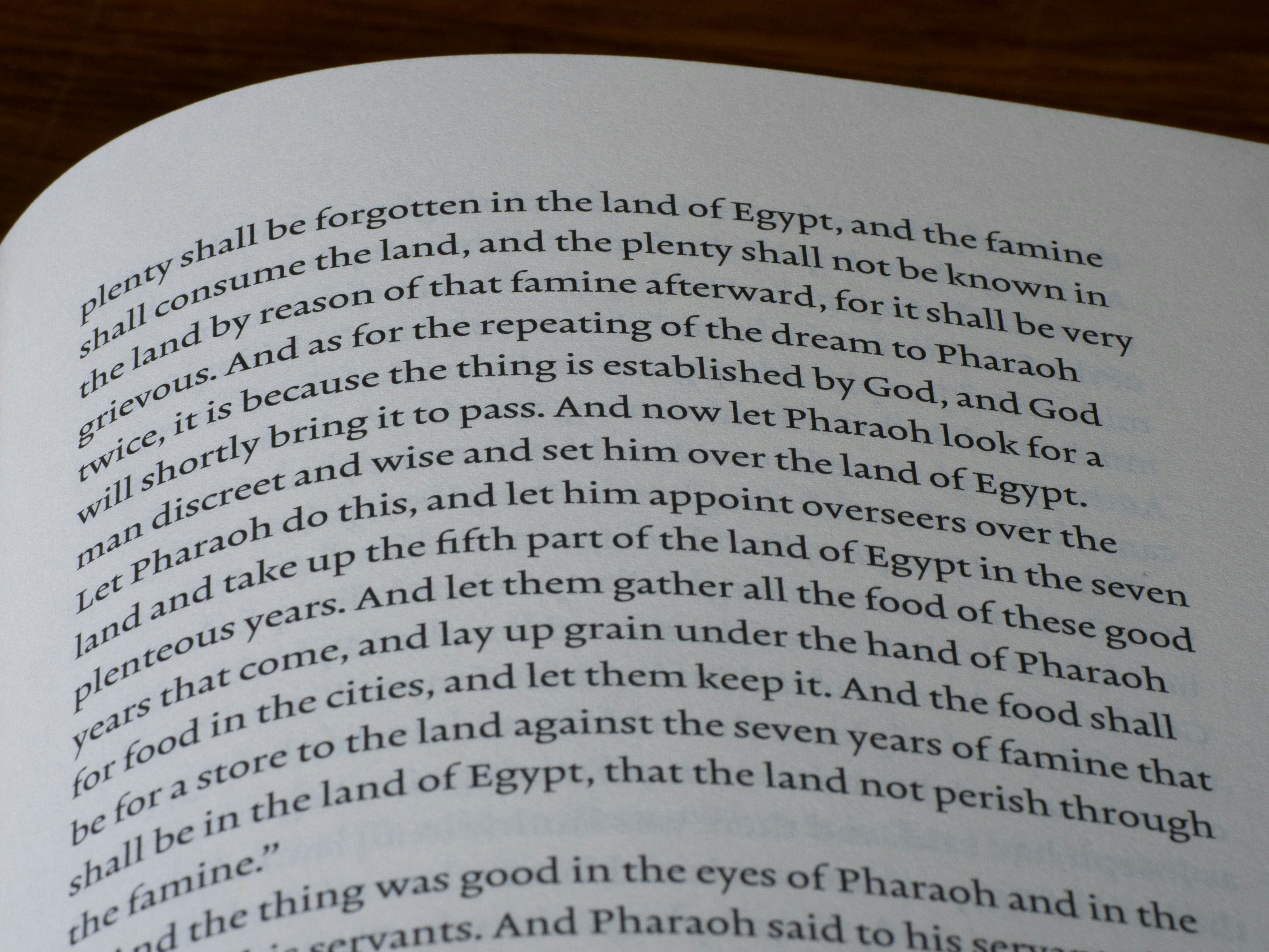 Close-up of an open book with text.