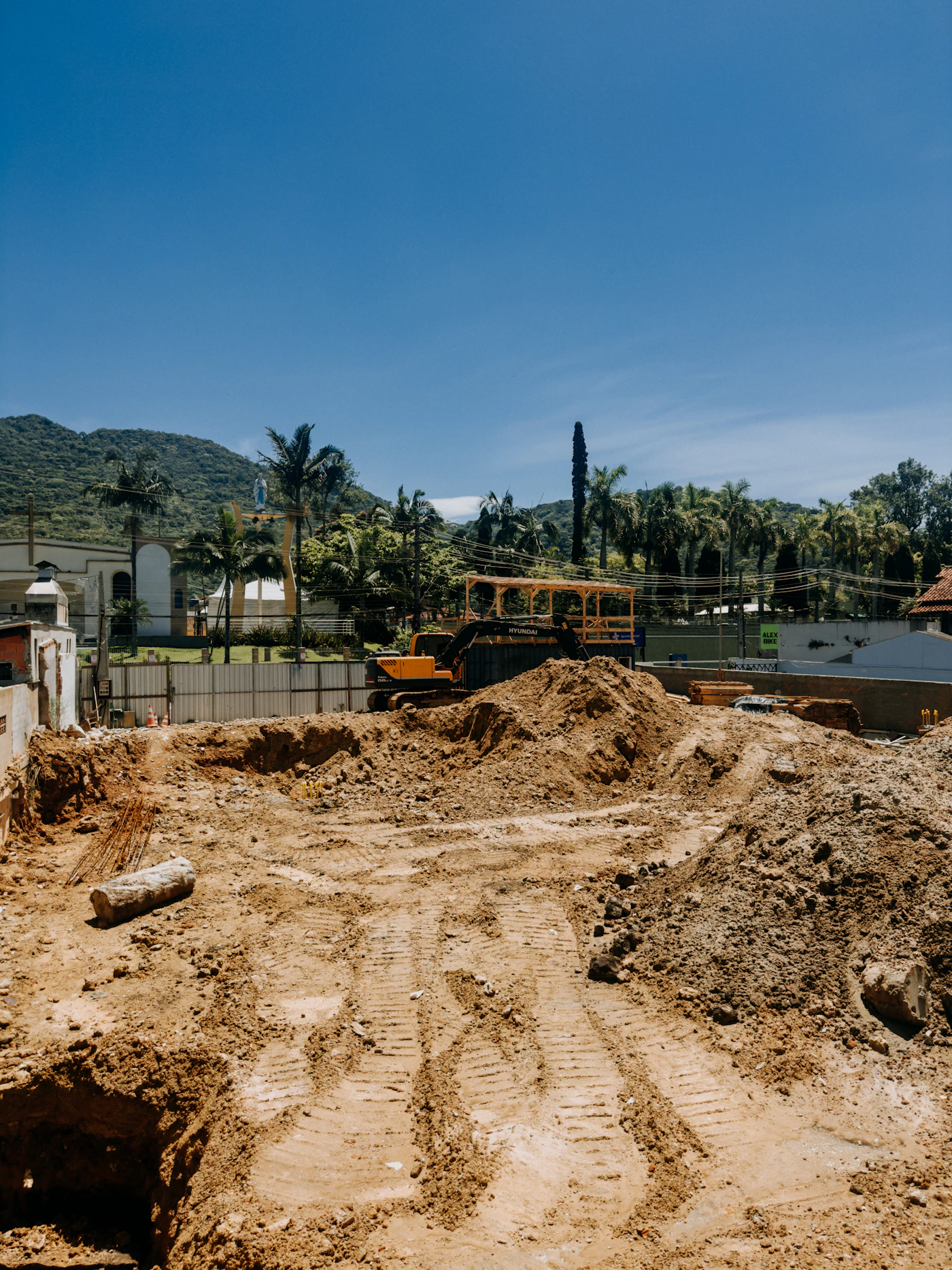 Excavator carrying out earthworks on a construction site