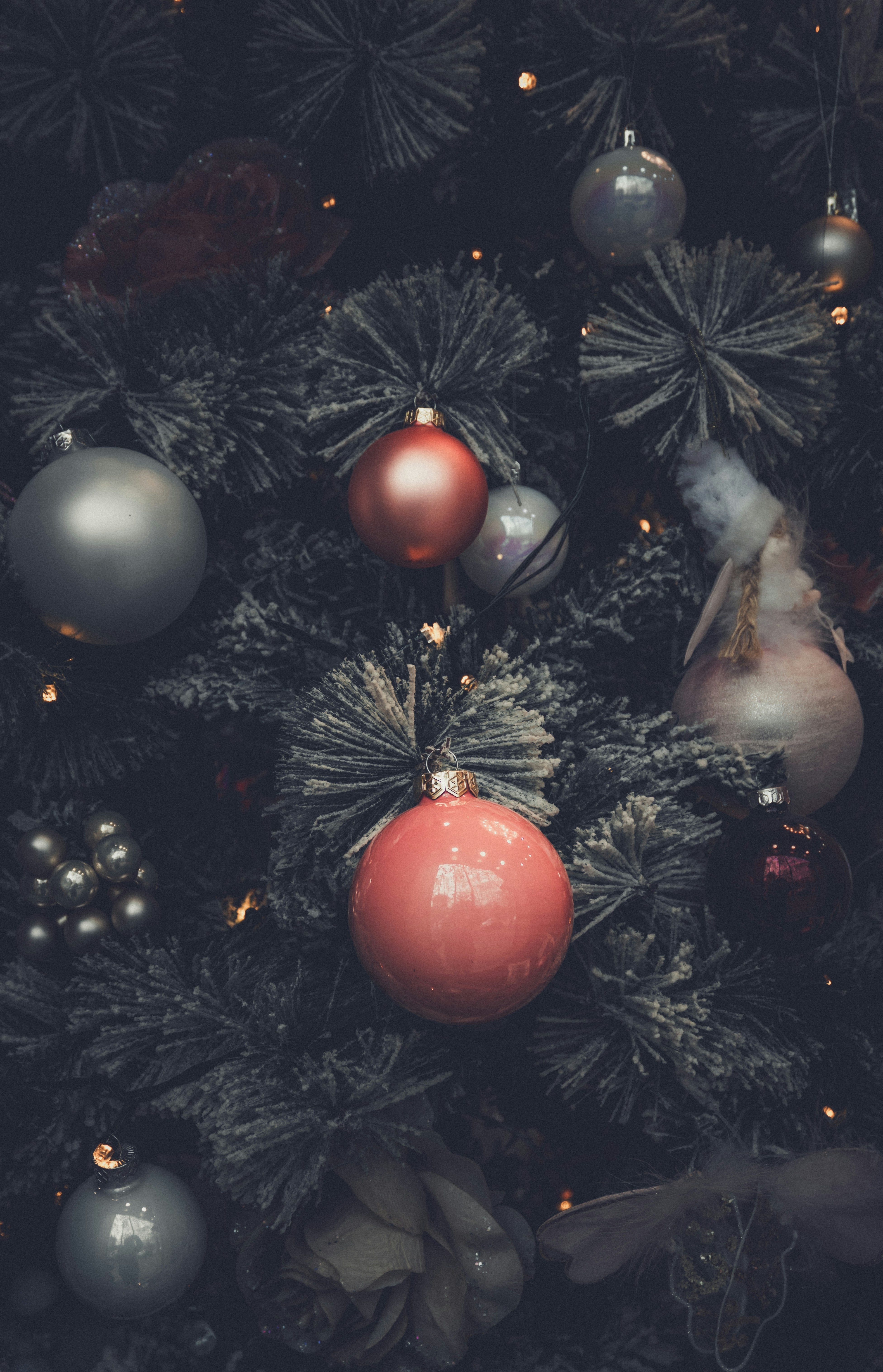 Close-up of a decorated christmas tree with ornaments.