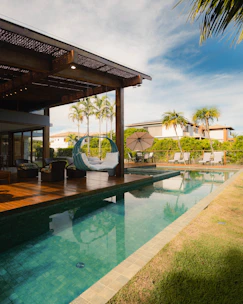 Modern house with pool and outdoor lounge area
