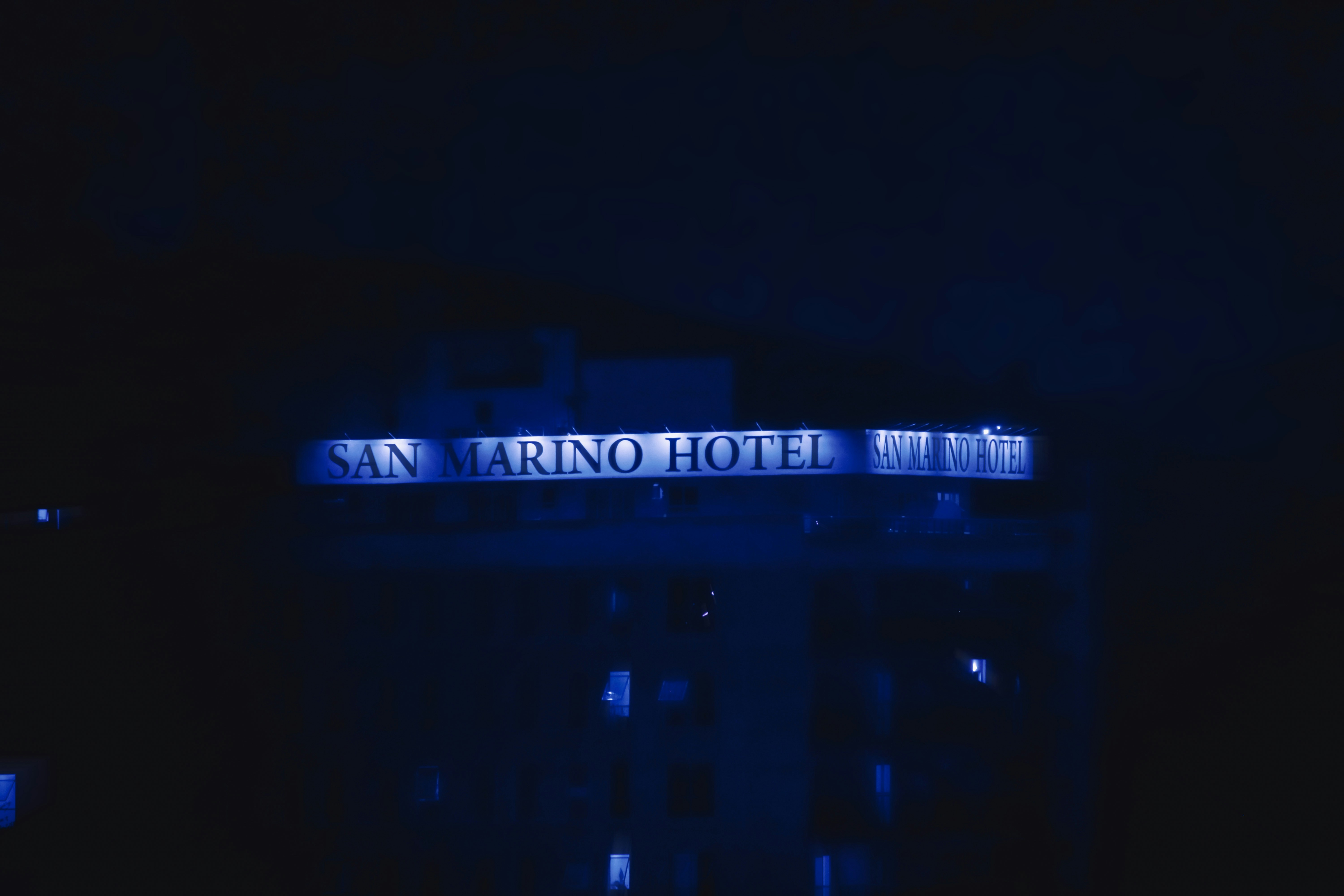 San marino hotel sign illuminated at night