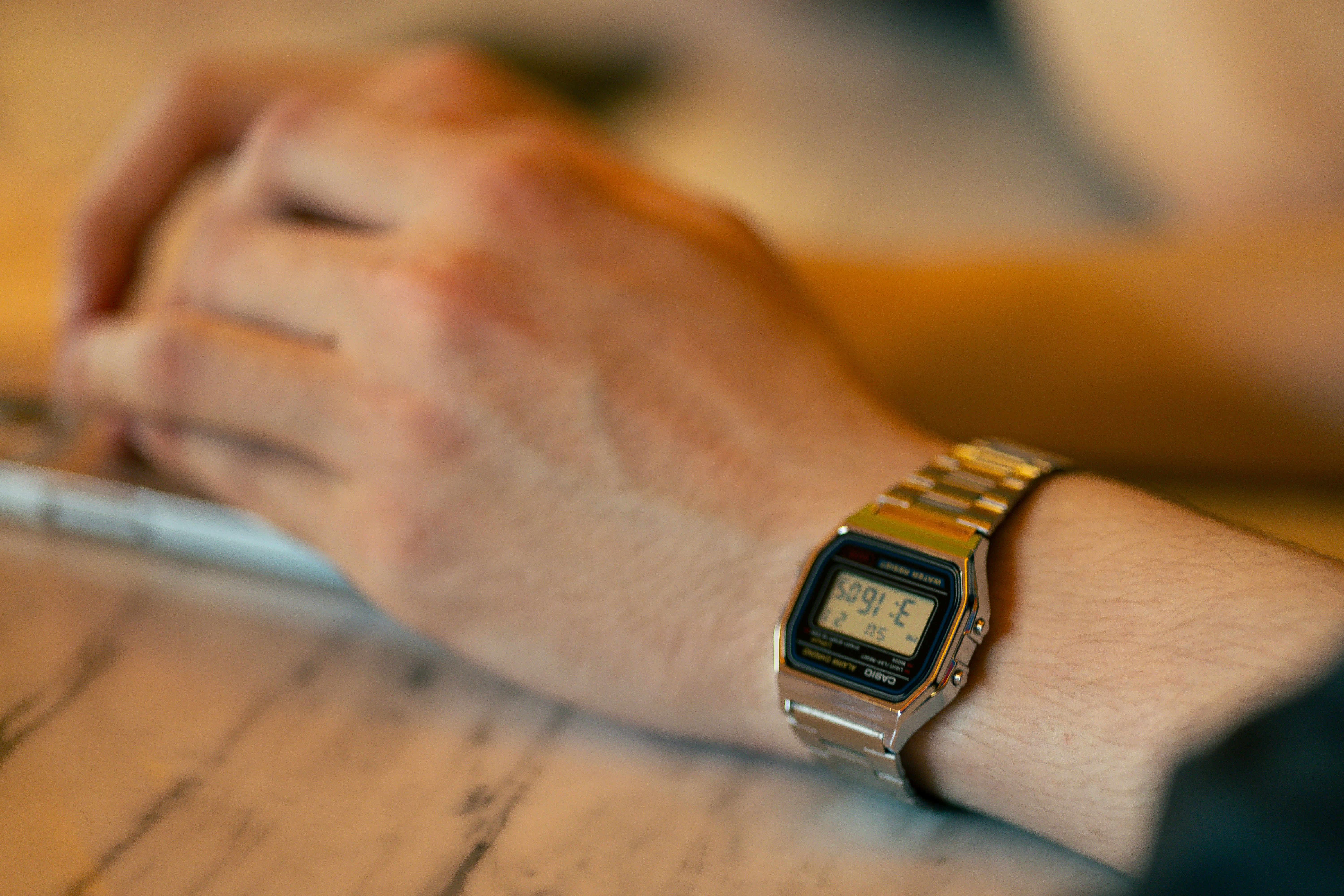 Close-up of a person wearing a digital watch