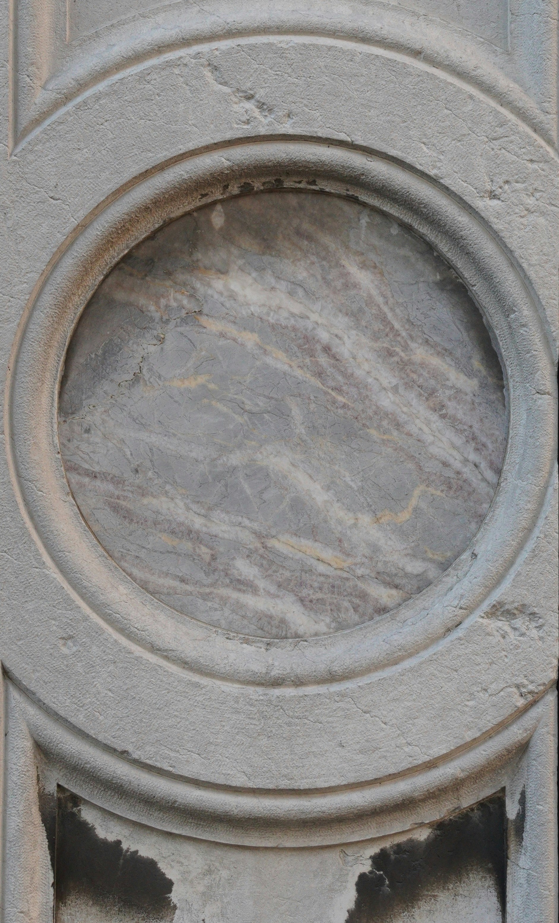 Stone carving with a marble inlay, Yorkville at dusk, retail facade and tower density