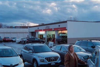 Cars parked in a lot outside a service center