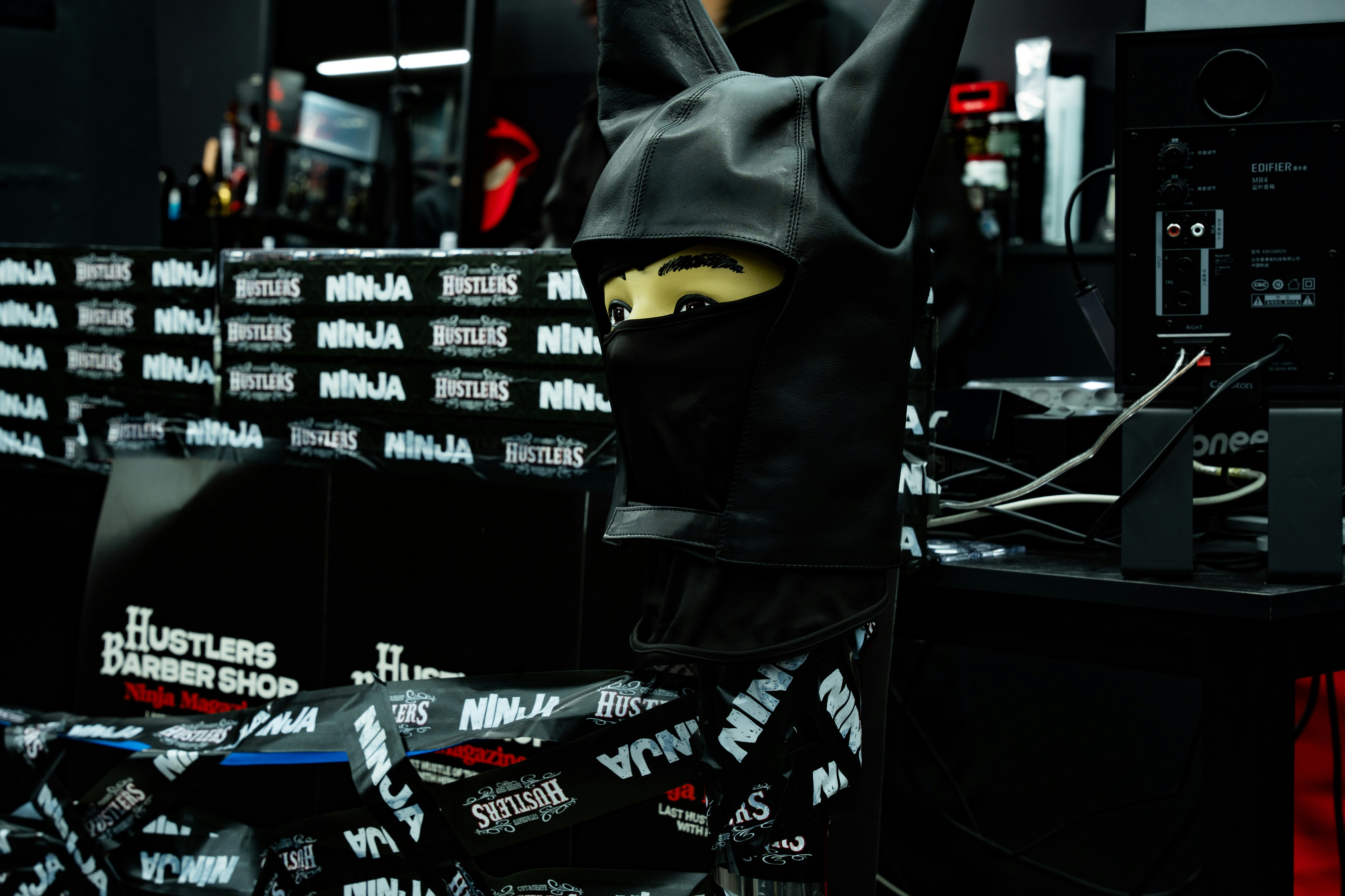 Mannequin wearing ninja-style mask and hoodie
