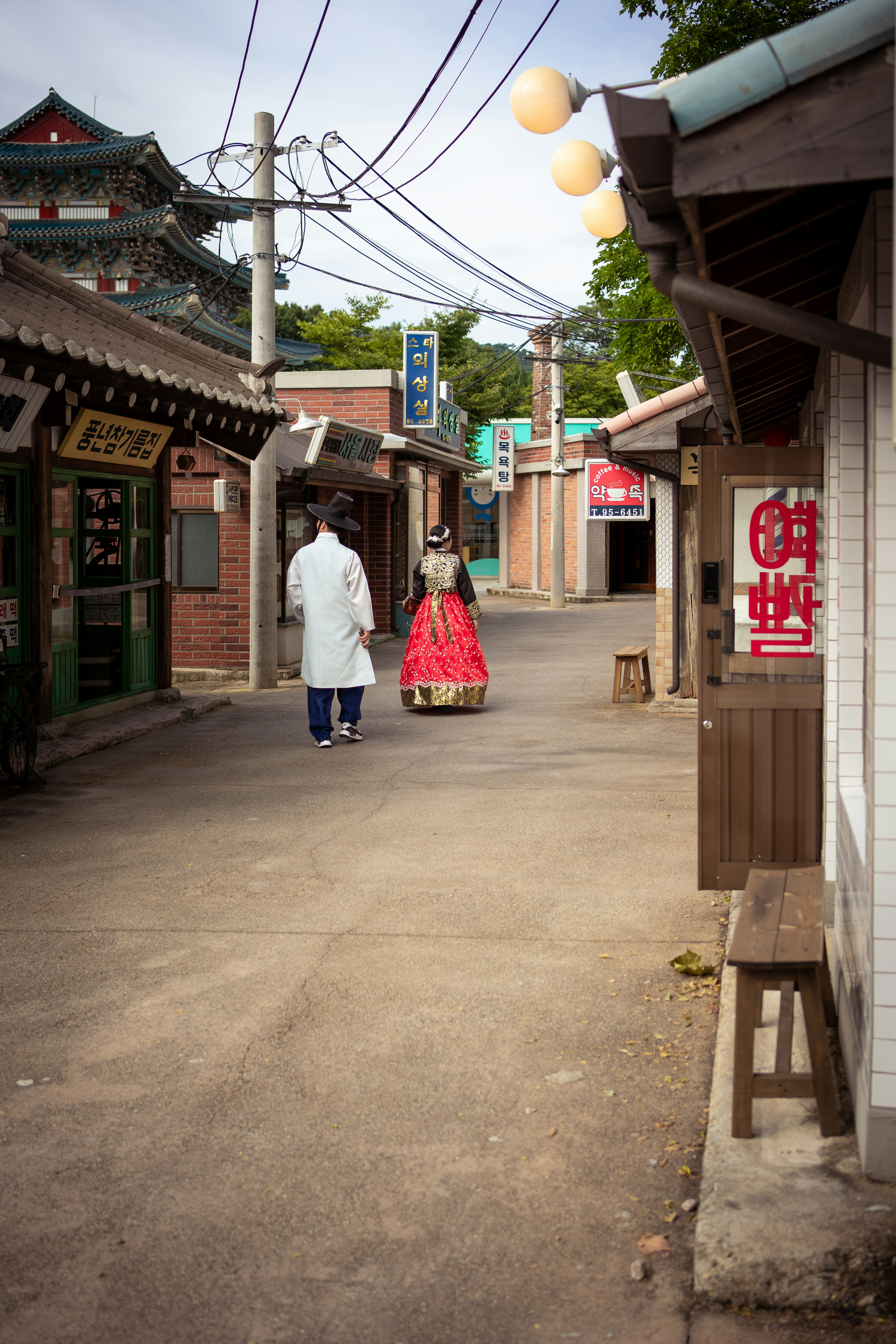 Couple walking down a traditional street