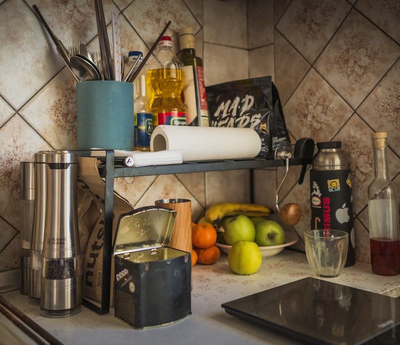 Expandable cabinet shelf rack organizer in kitchen