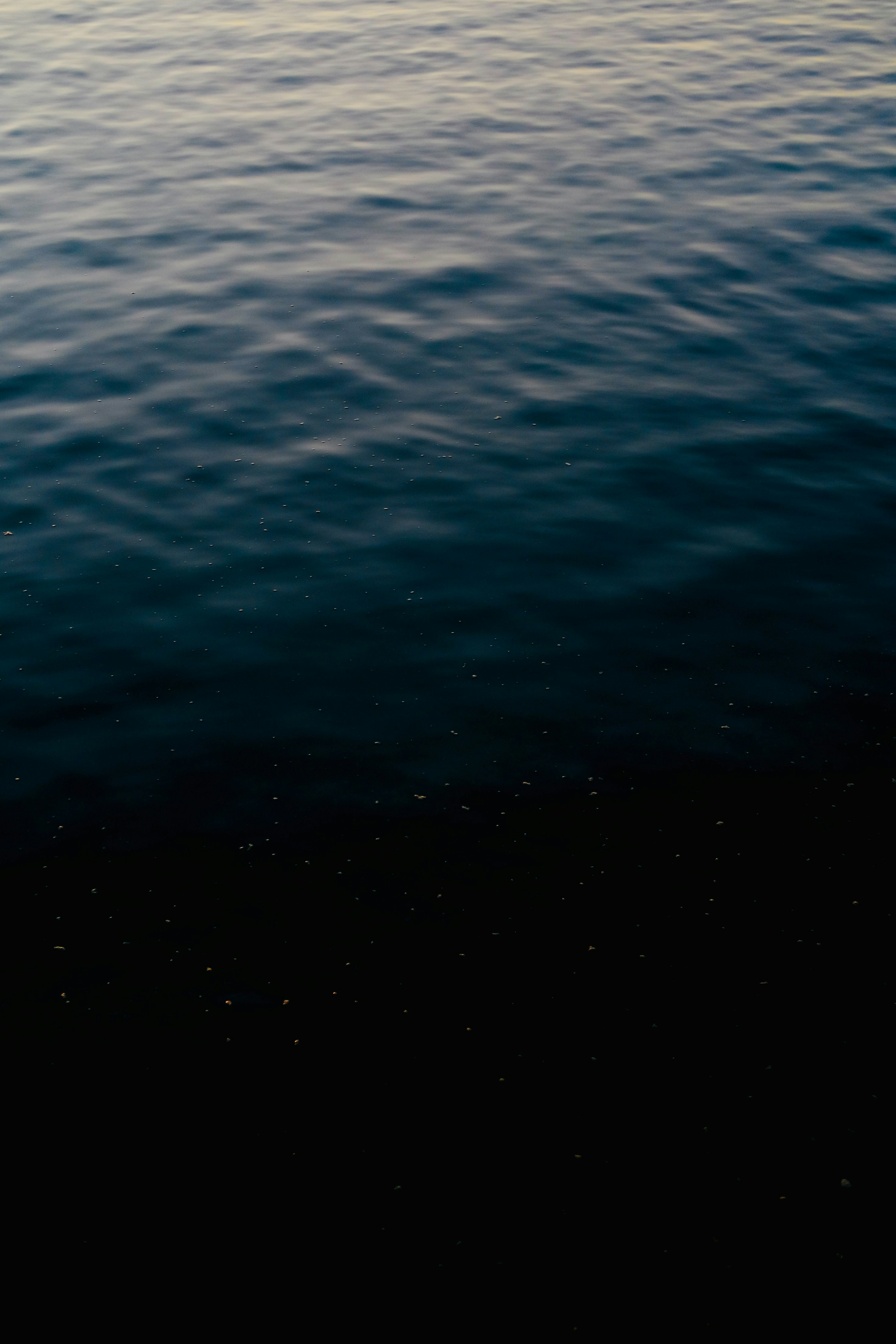 Dark blue ocean water with small ripples