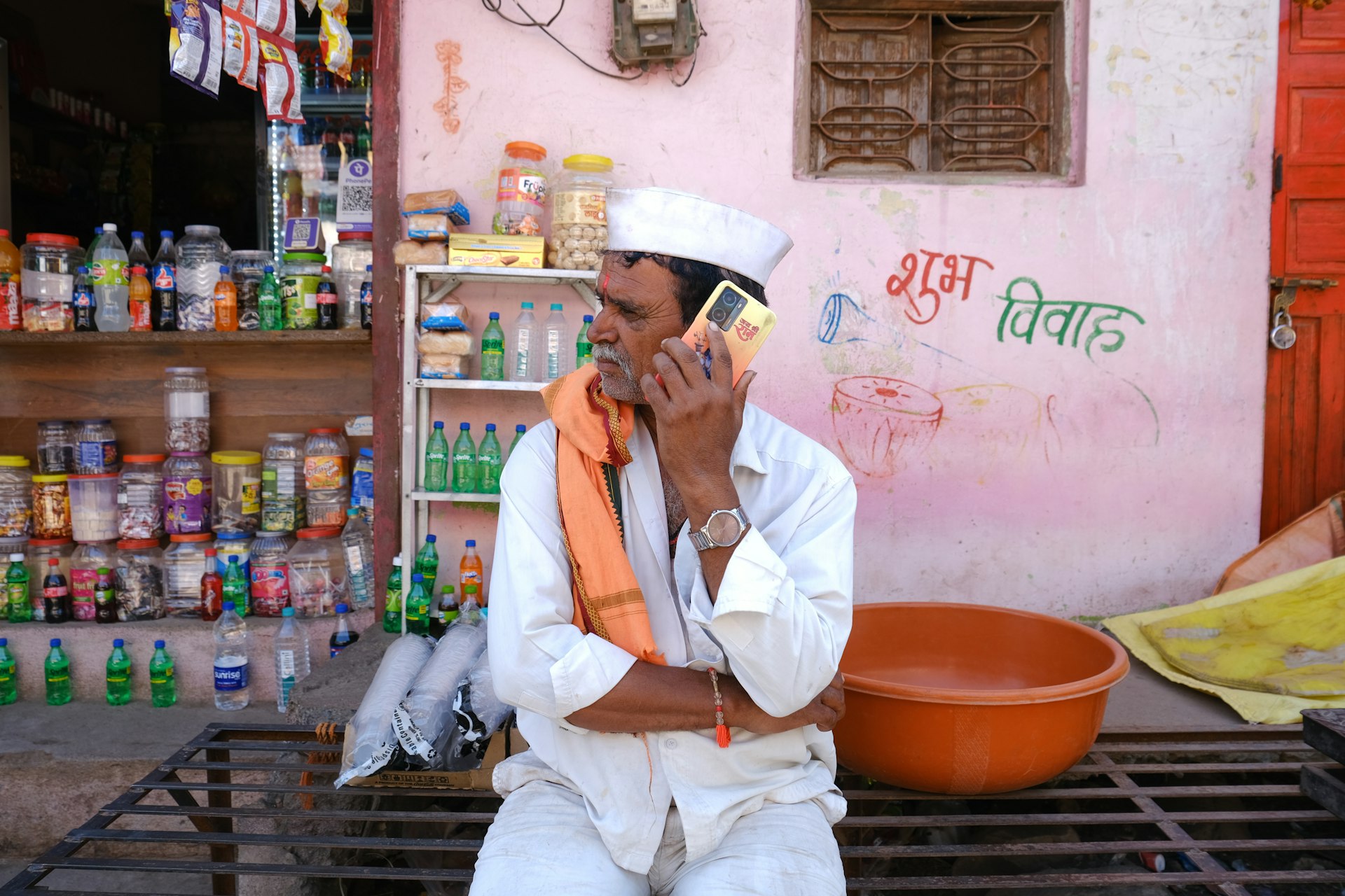 Indian Man Talking on Phone for Support