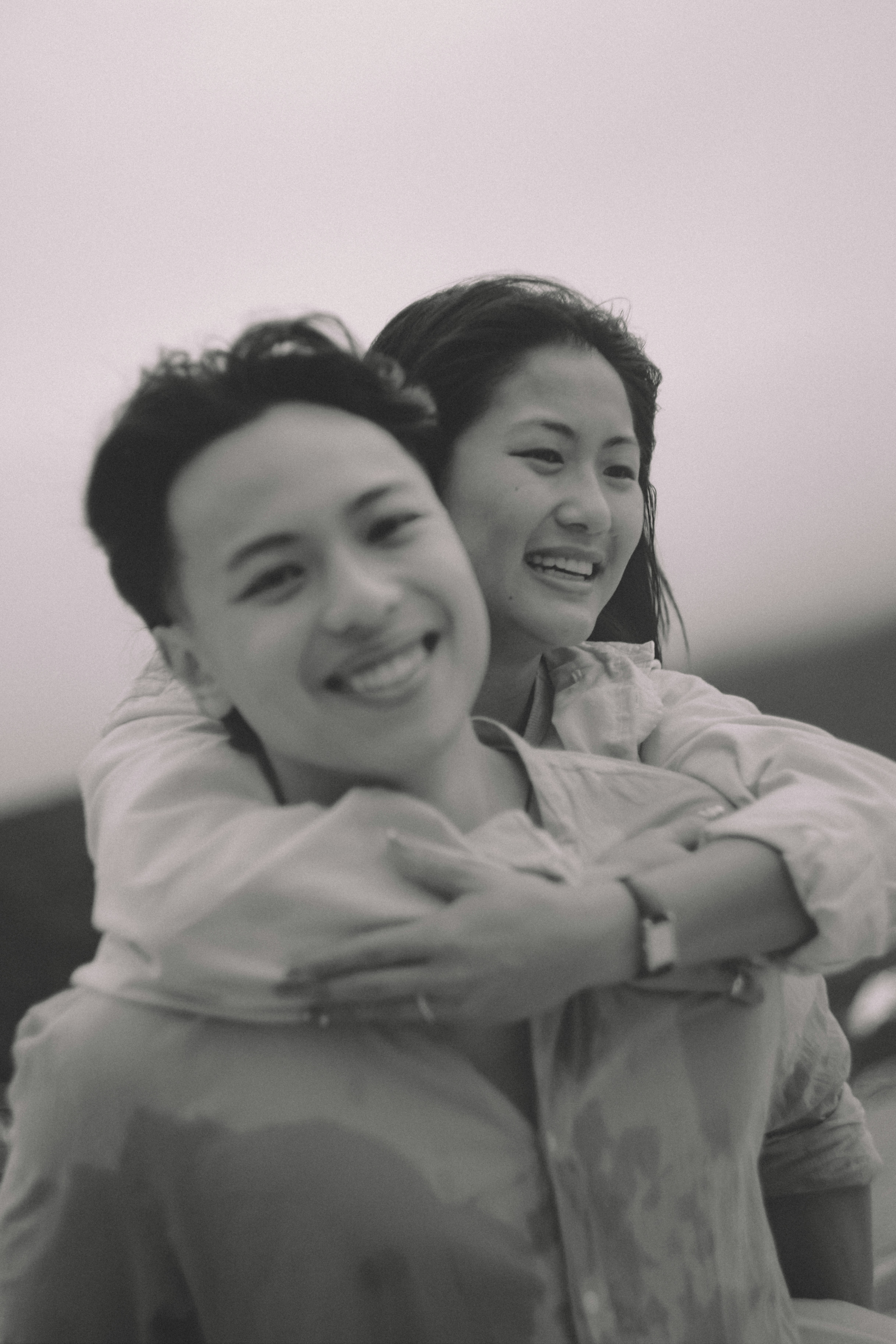 Couple embracing outdoors with smiles