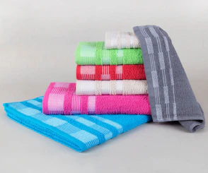 Stack of colorful folded towels on a white background