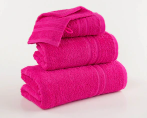 Stack of three vibrant pink bath towels