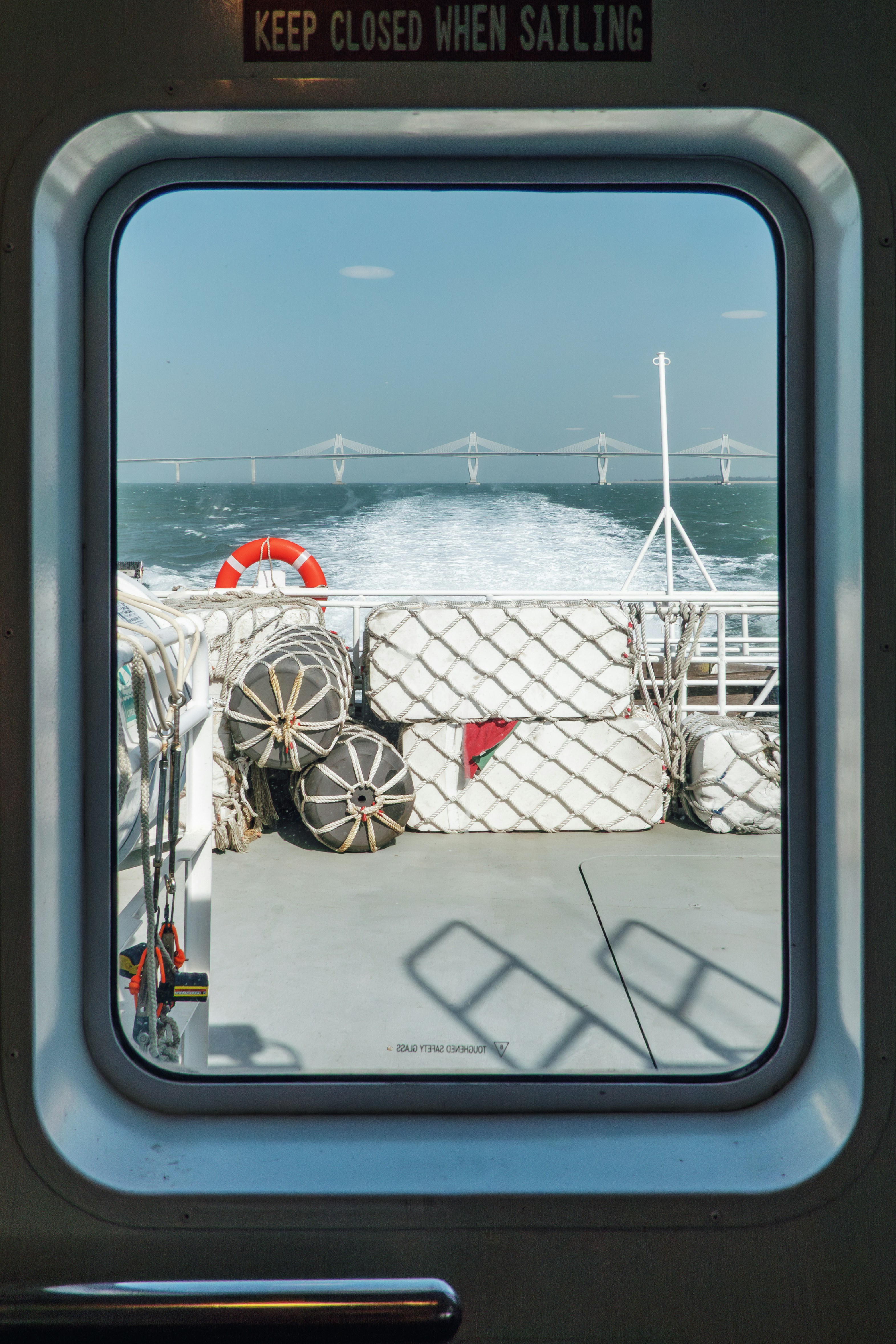 View of a bridge from a moving ferry