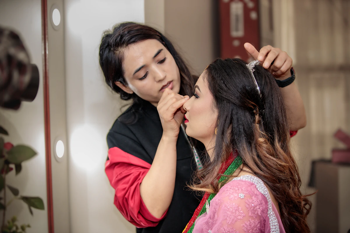 Woman getting her hair styled by a hair stylist