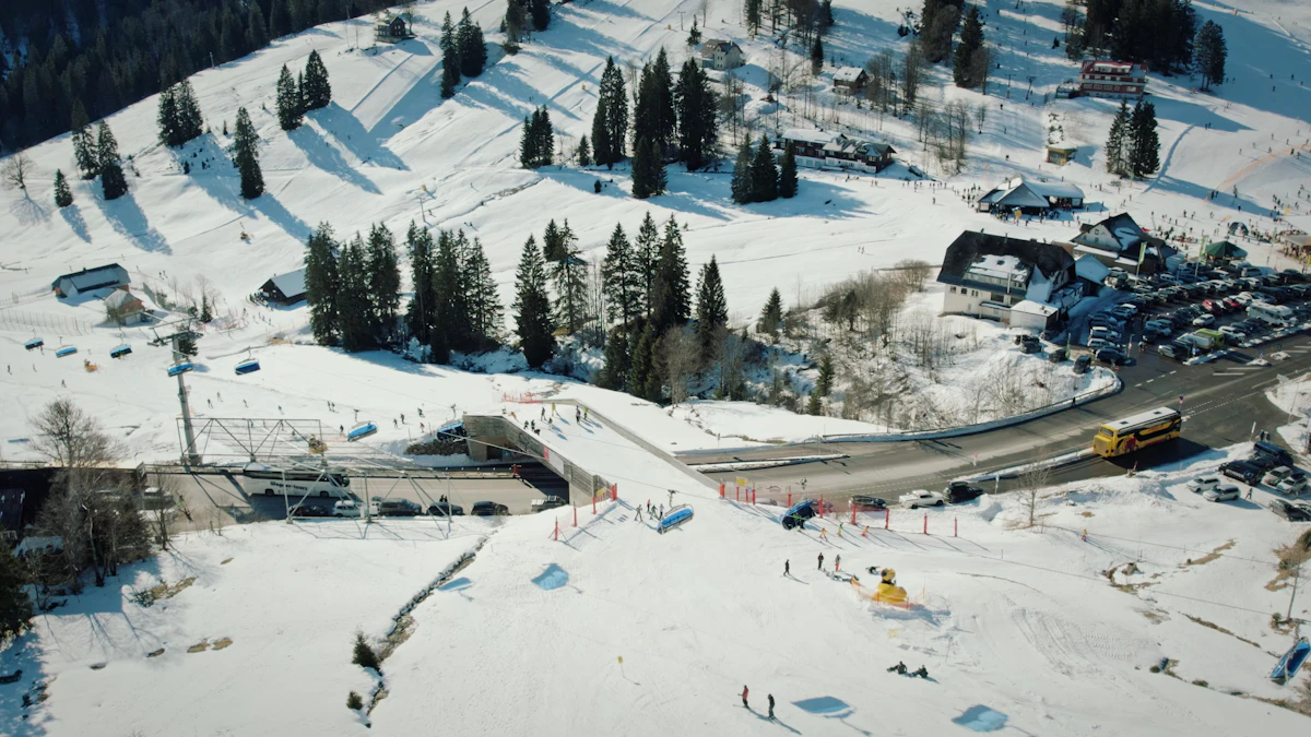 Winter mountain resort with snow-covered trees and lodge buildings