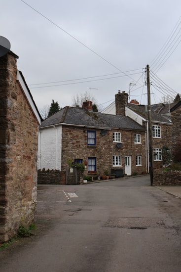 Traditional stone village cottages with slate roofs at Helton