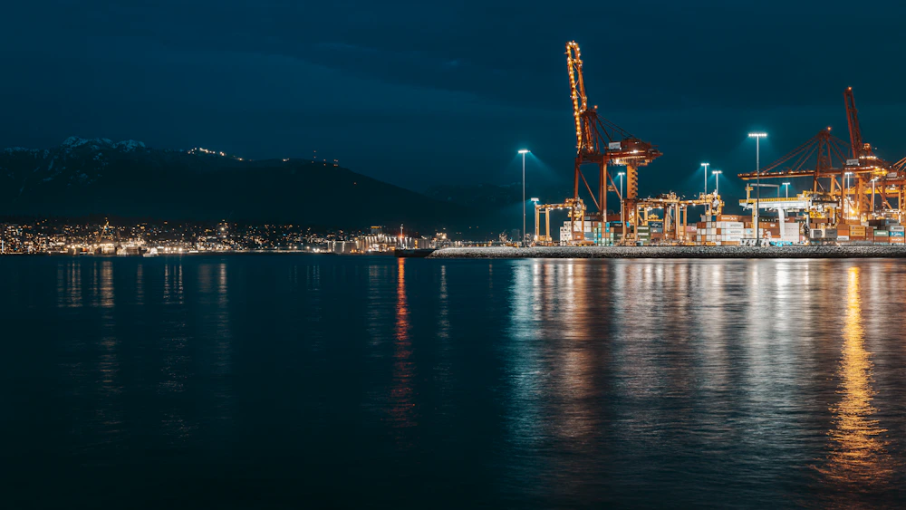 Port of Vancouver lights reflected on the water at night