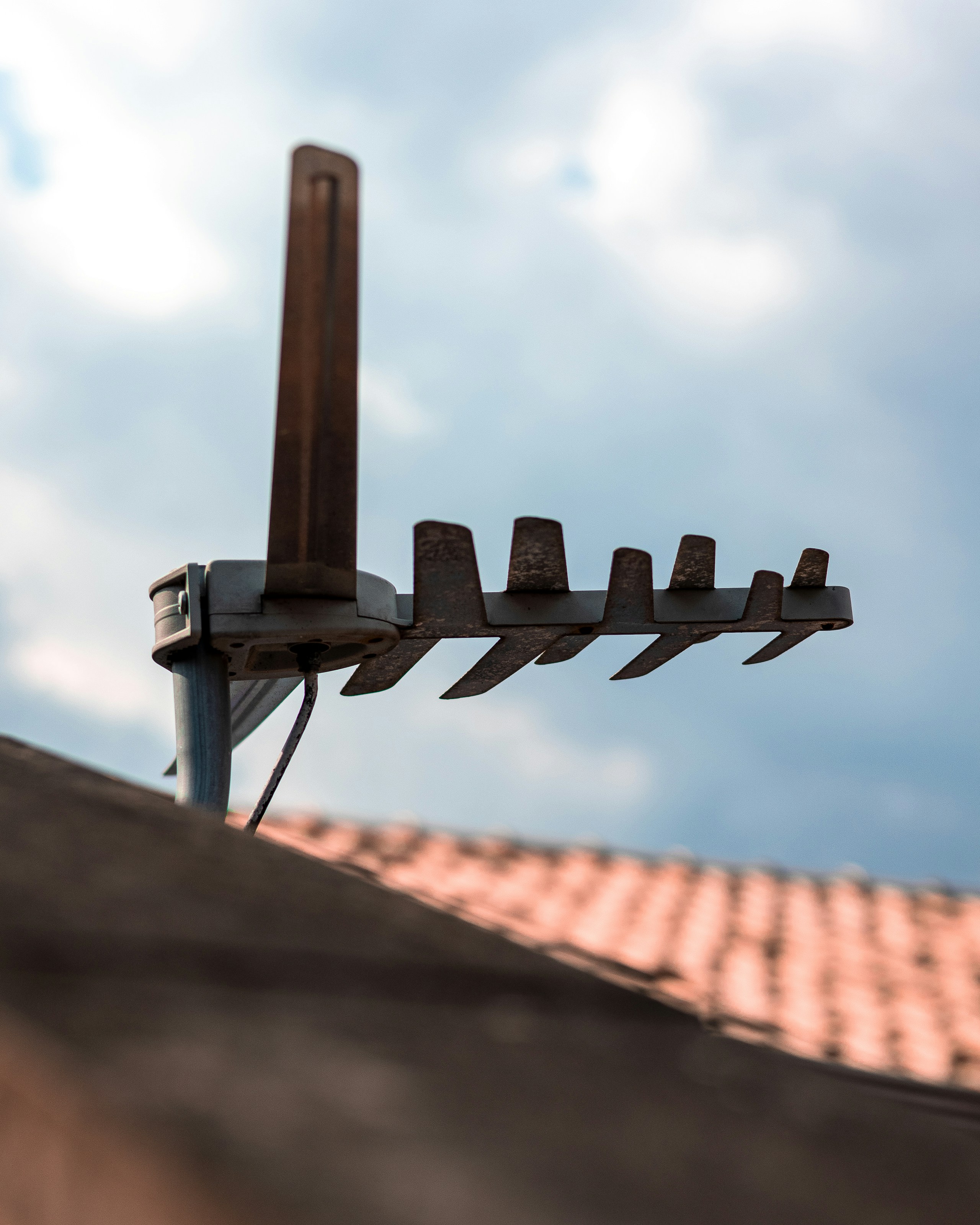 Old television antenna on a rooftop