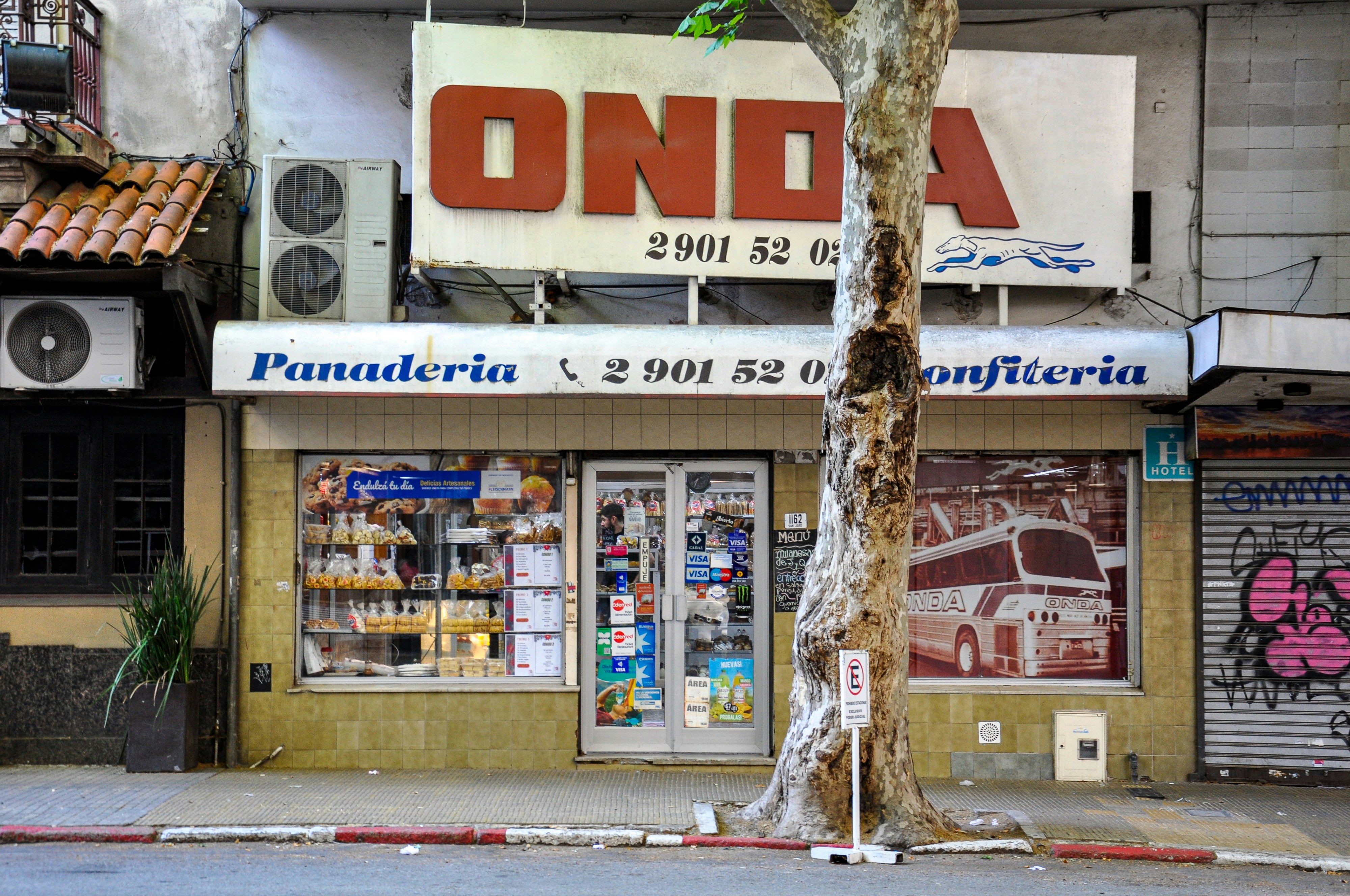 A storefront for a bakery and confectionery shop.