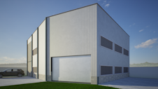Modern industrial building with large garage door.