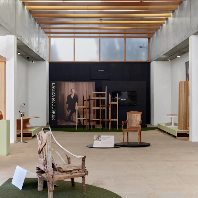 Interior view of a furniture exhibition with unusual chairs
