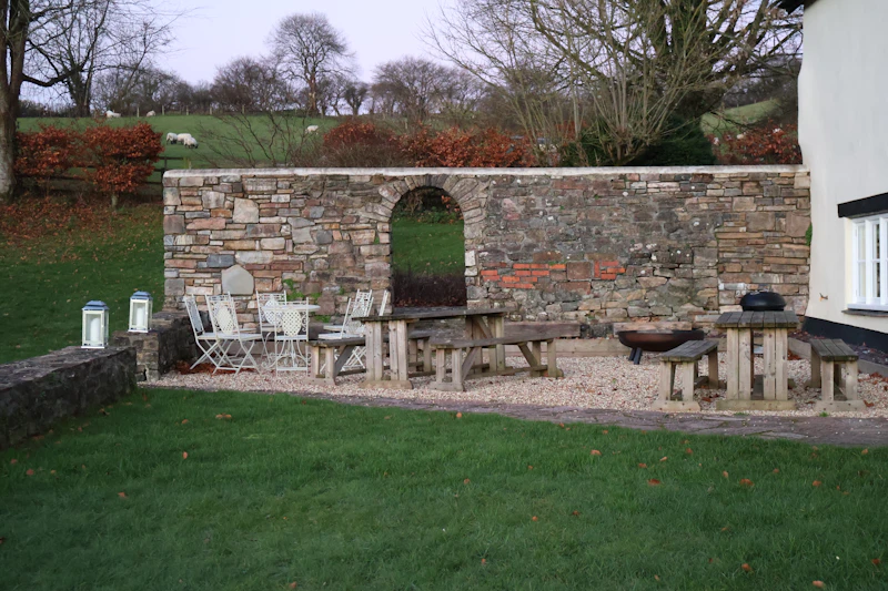 Hardscape design with custom stone patio and walkway