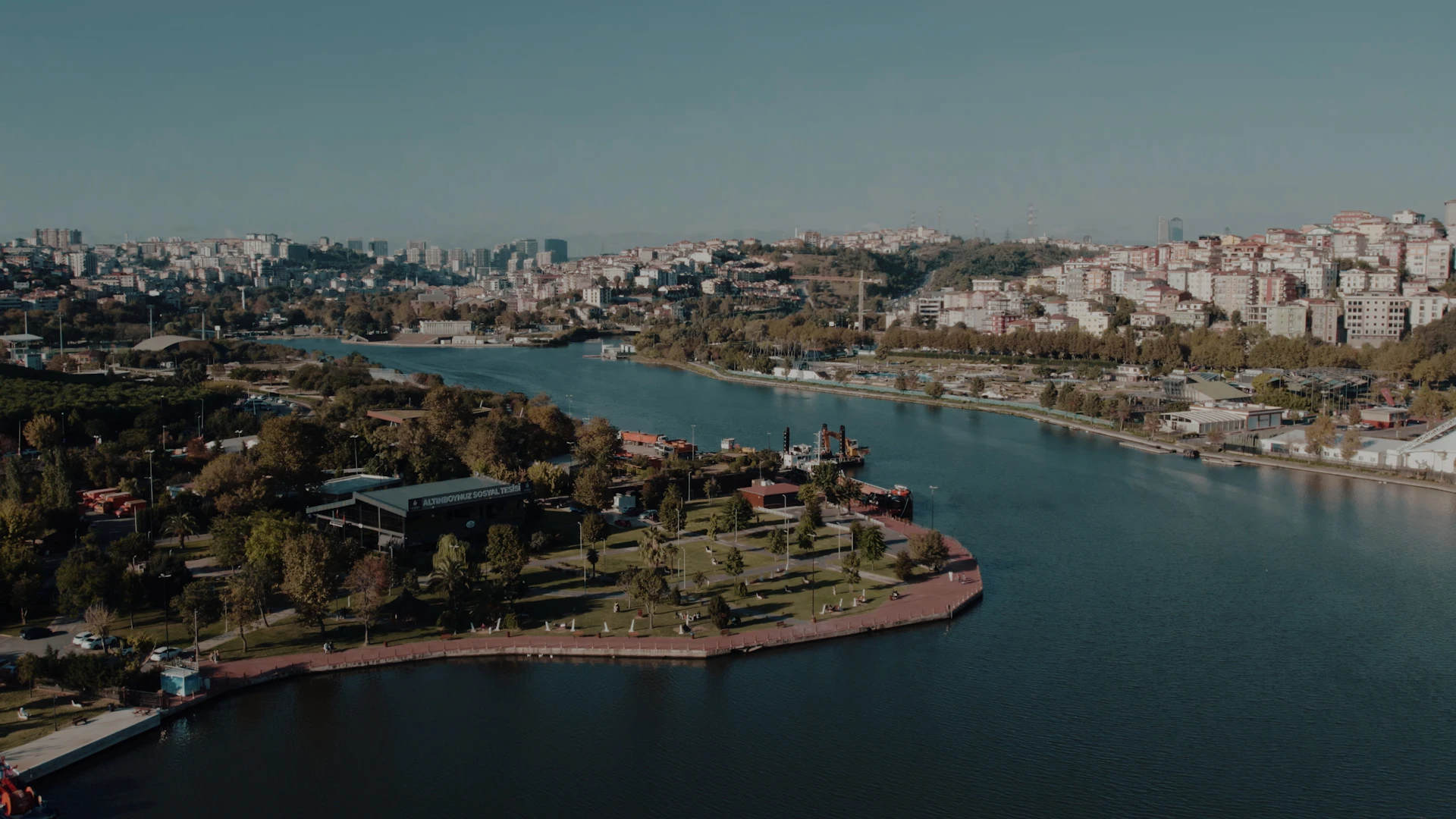 Urban landscape with a river flowing through a city.