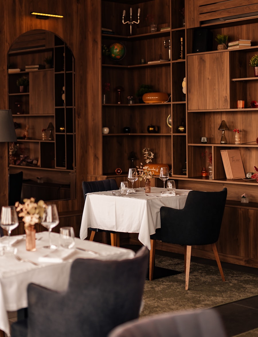 Elegant dining tables in a warm, intimate restaurant setting