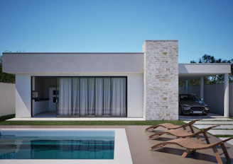 Modern house with swimming pool and car