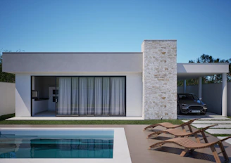 Modern house with swimming pool and car