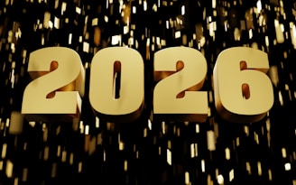 Golden 2026 numbers with falling confetti.