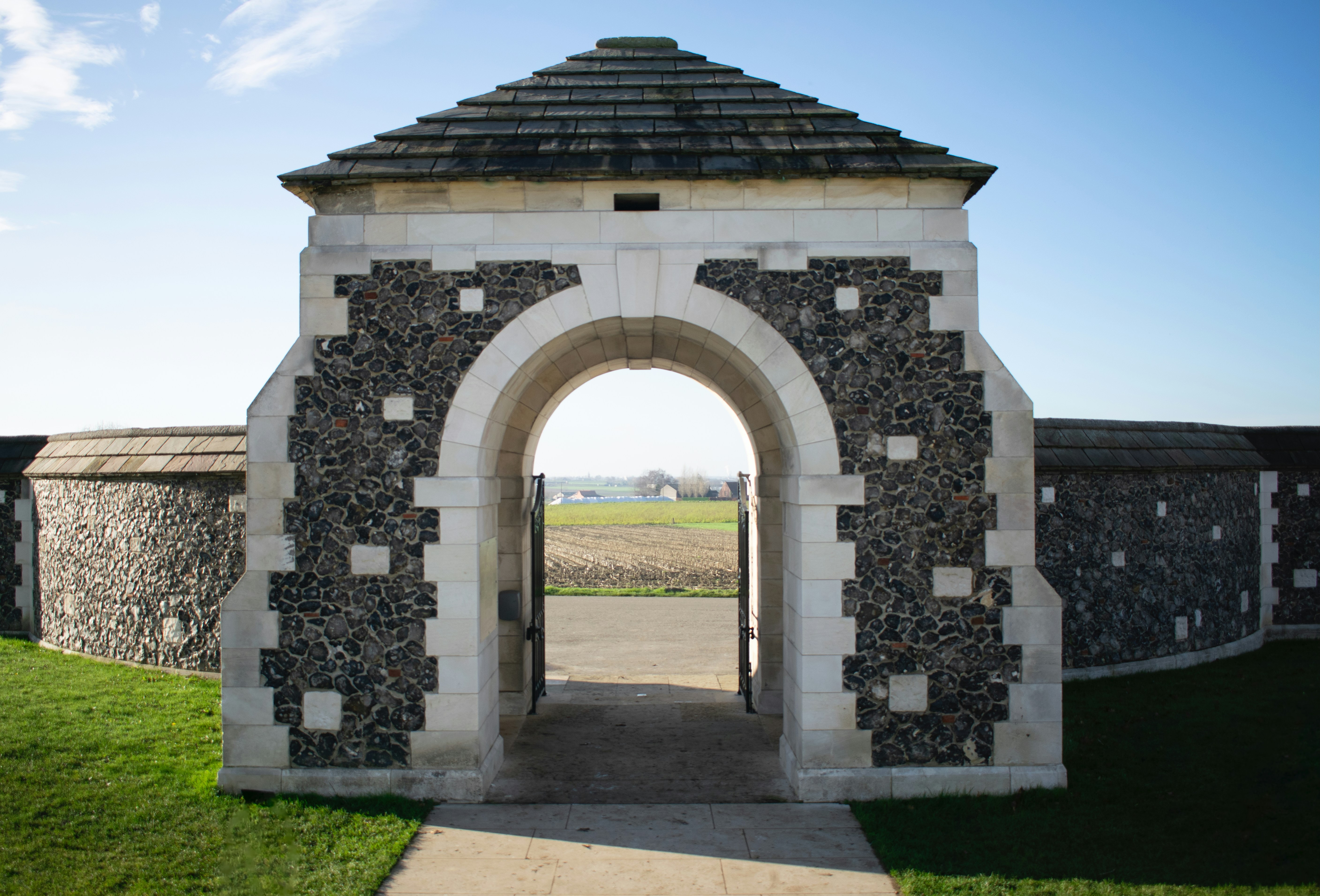 Stone archway entrance to a historic memorial site