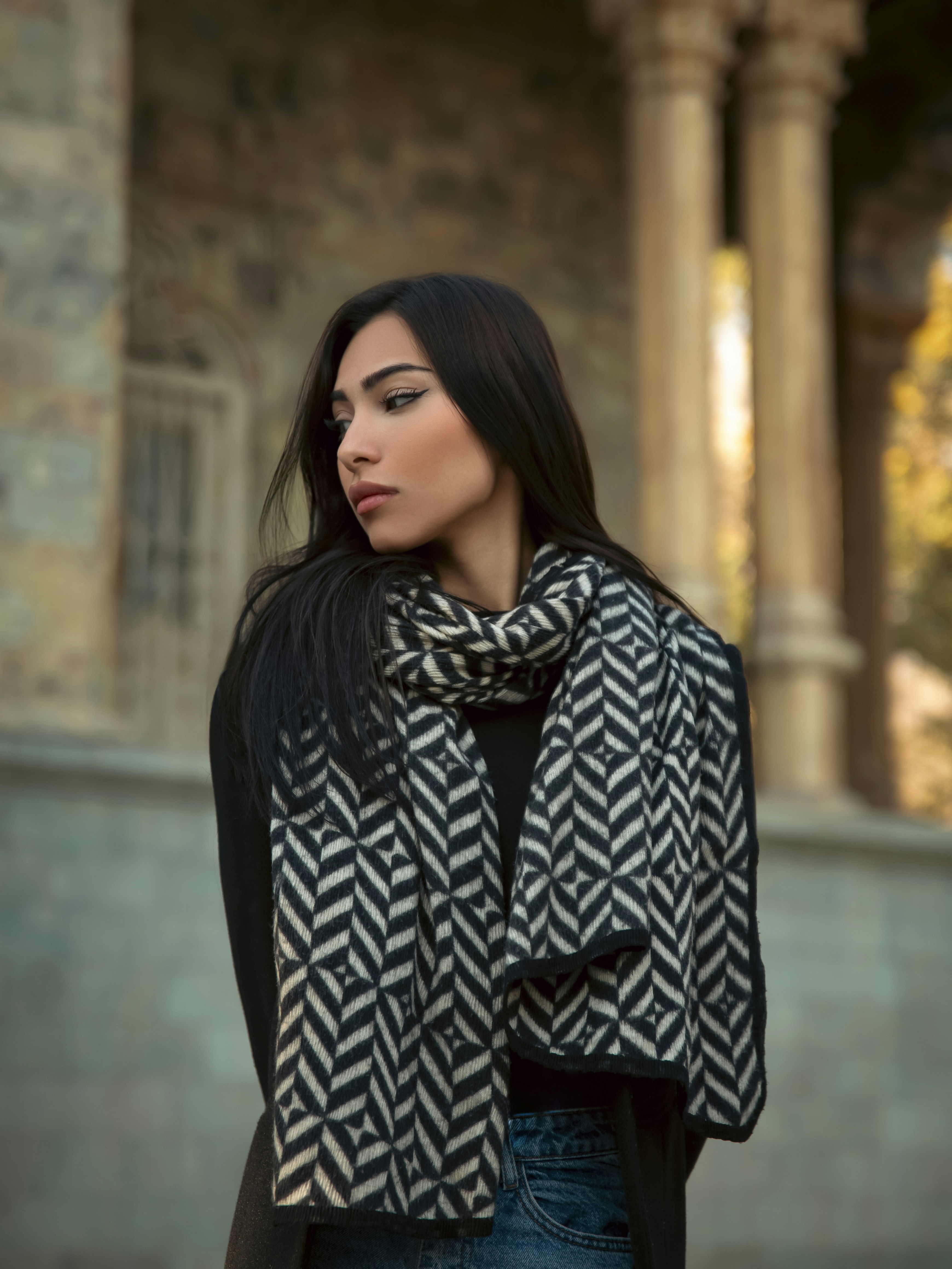Woman wearing a patterned scarf outdoors
