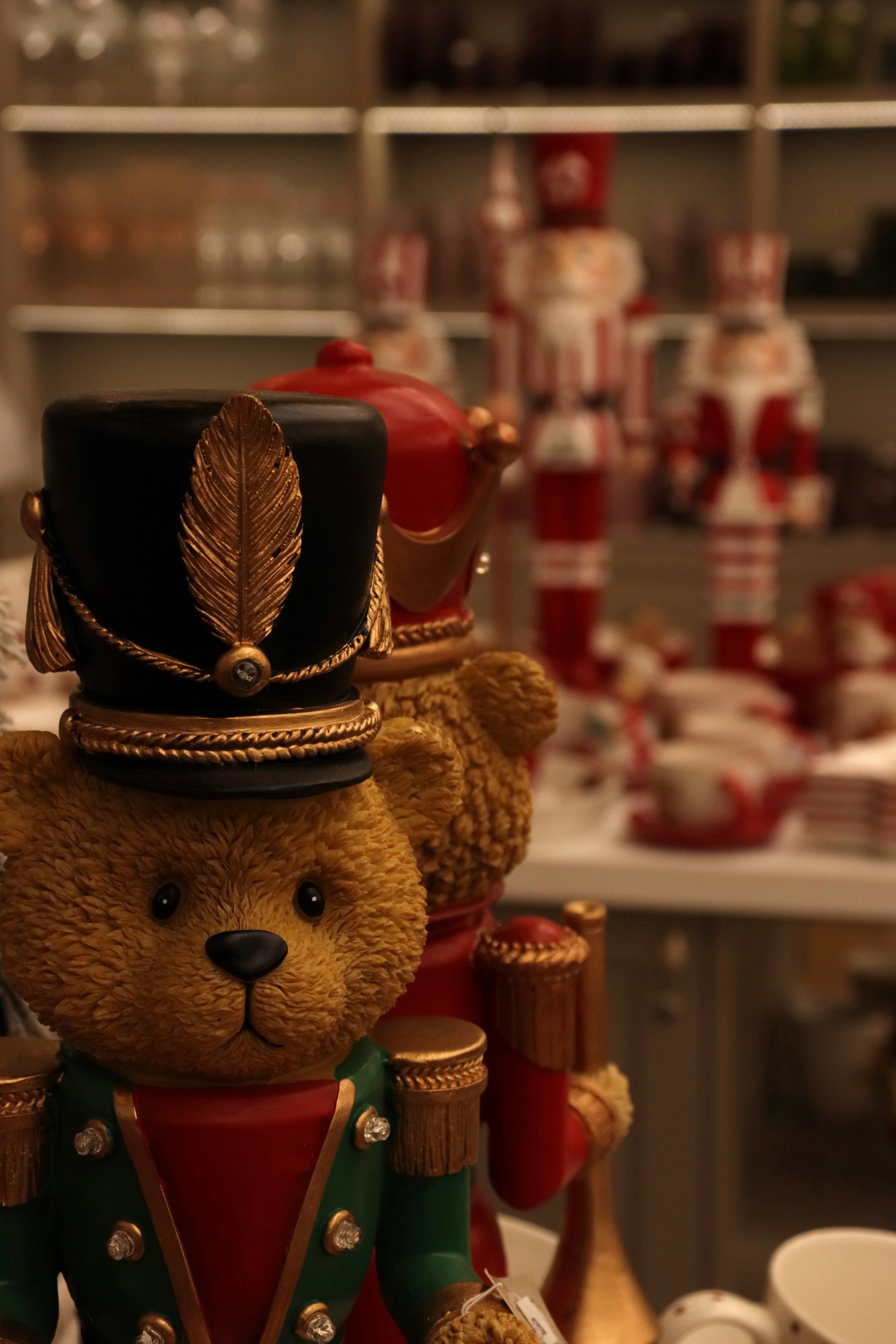 Teddy bear nutcracker figures in festive display