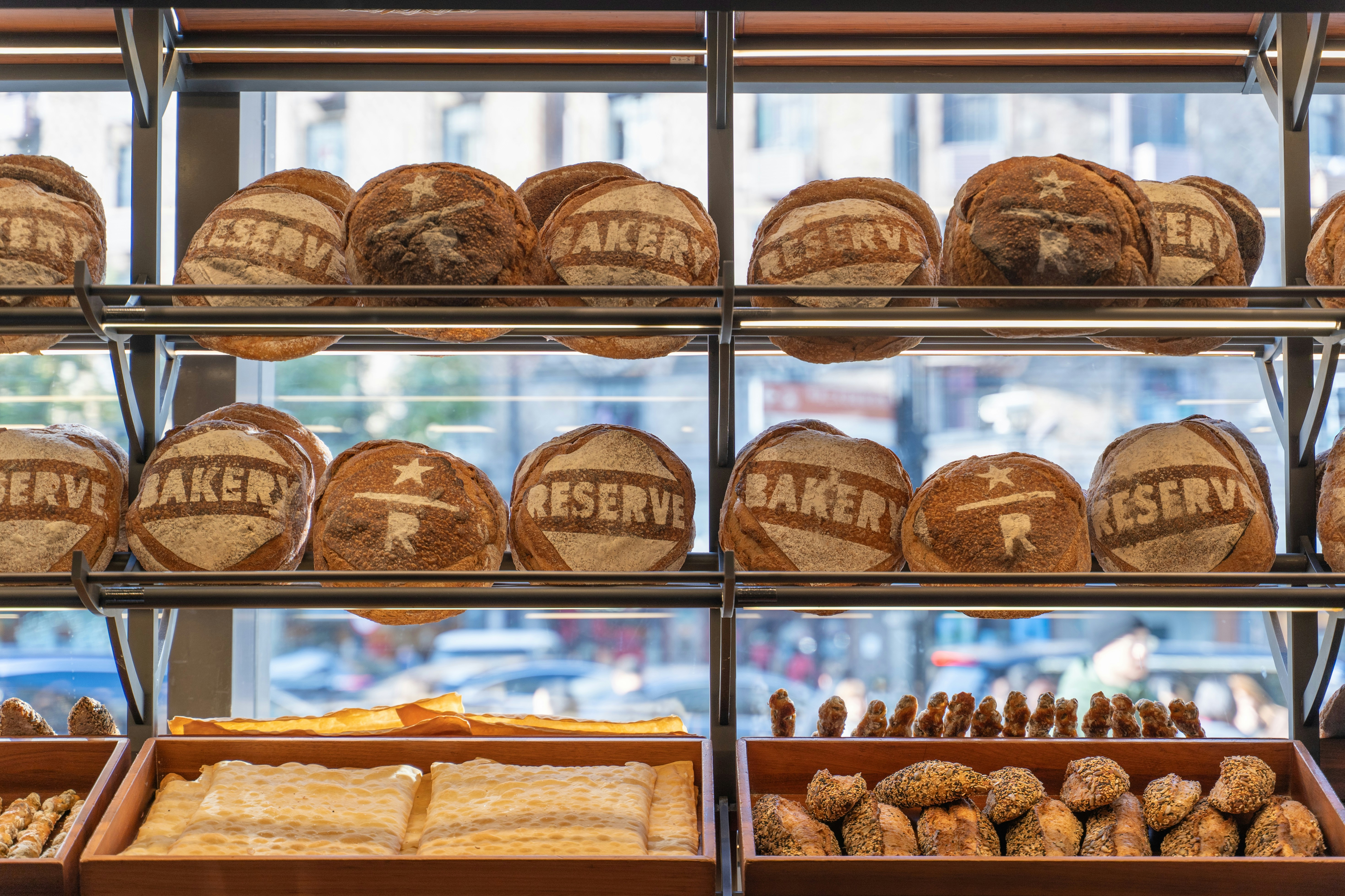 Fresh bread loaves on shelves