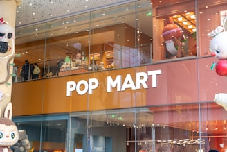 Pop mart store with large display figures