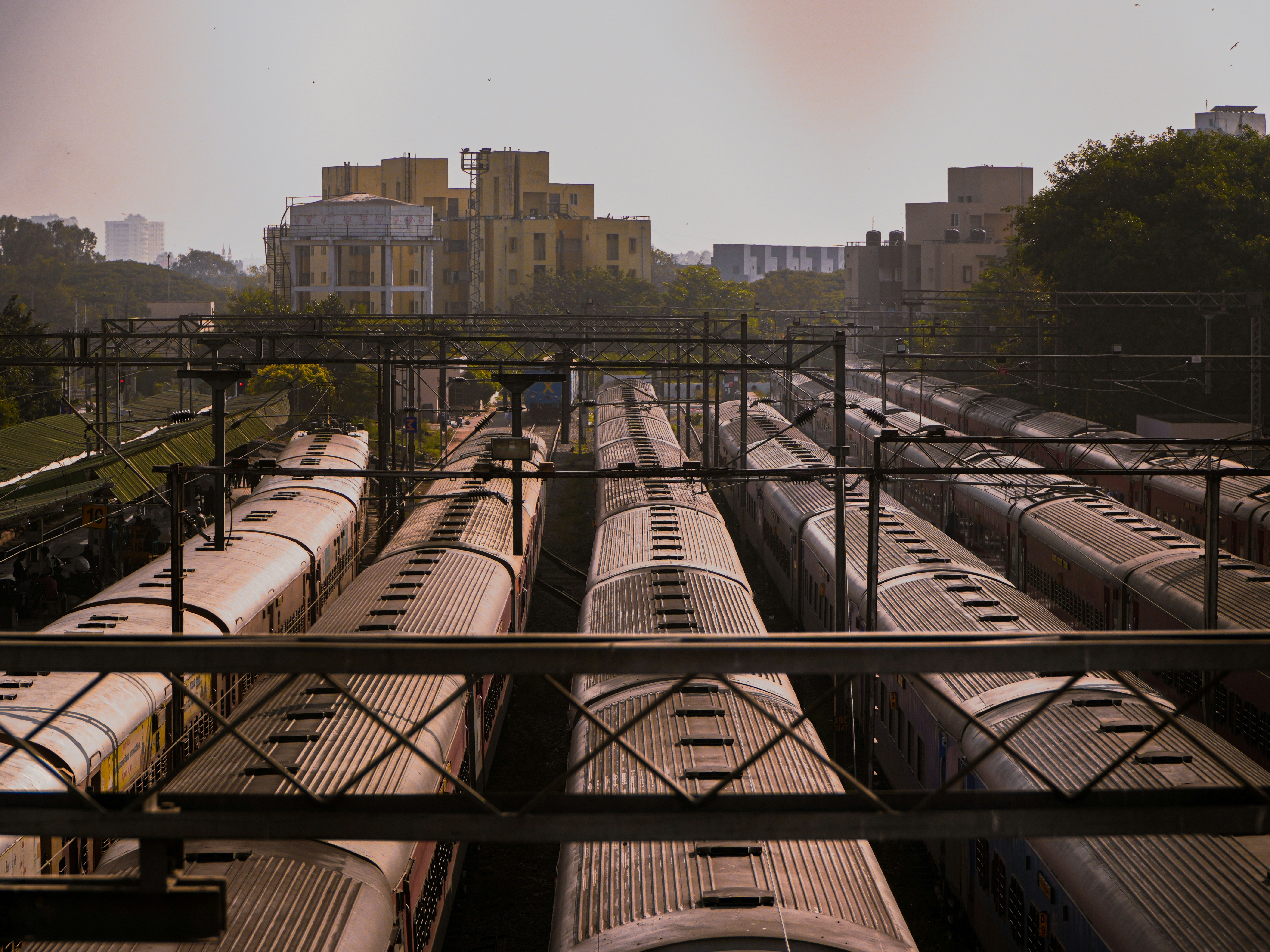 Rows of passenger trains at a station.