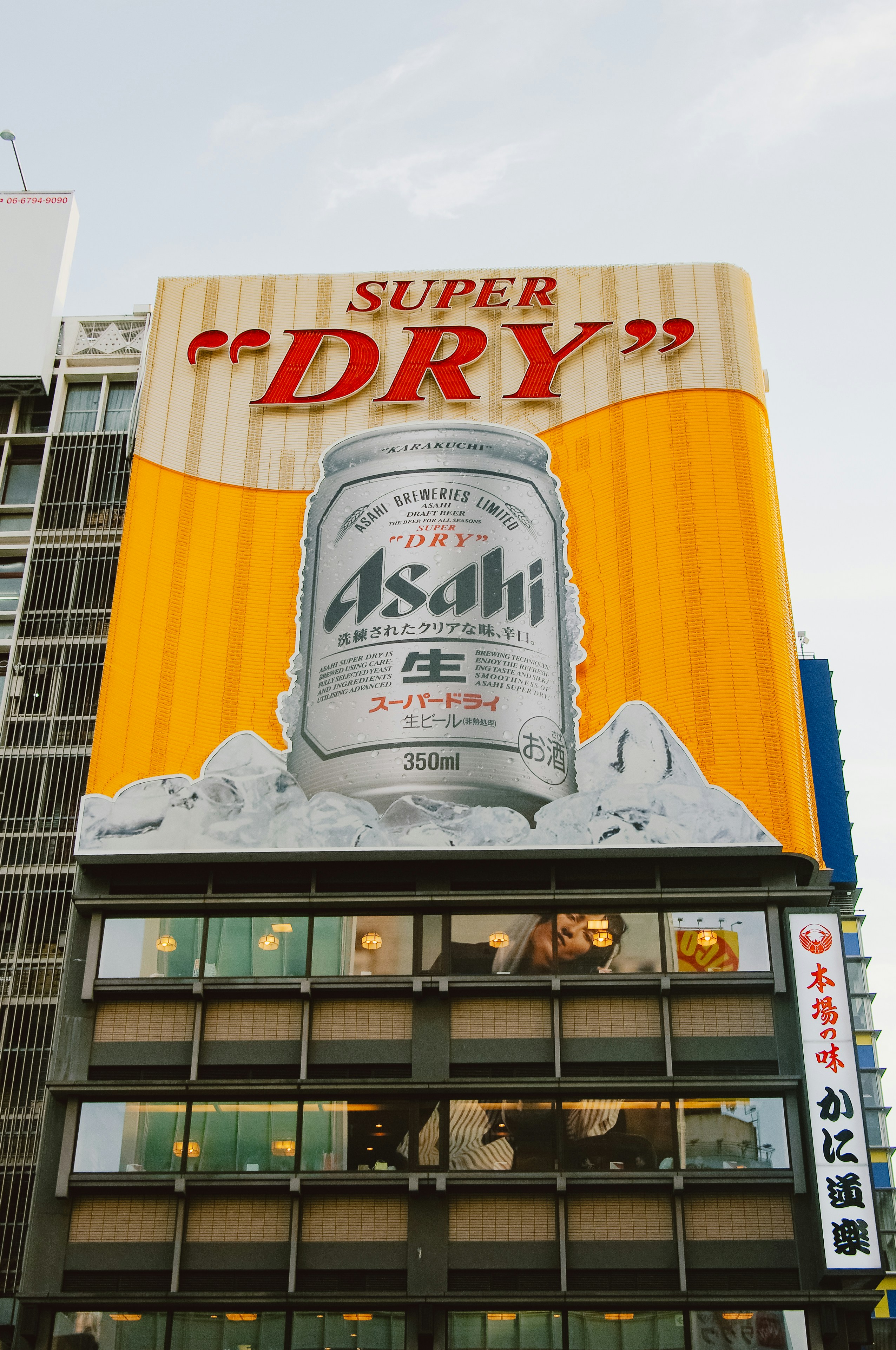 Giant asahi super dry can advertisement on building
