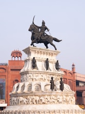 Equestrian statue of a warrior on a monument