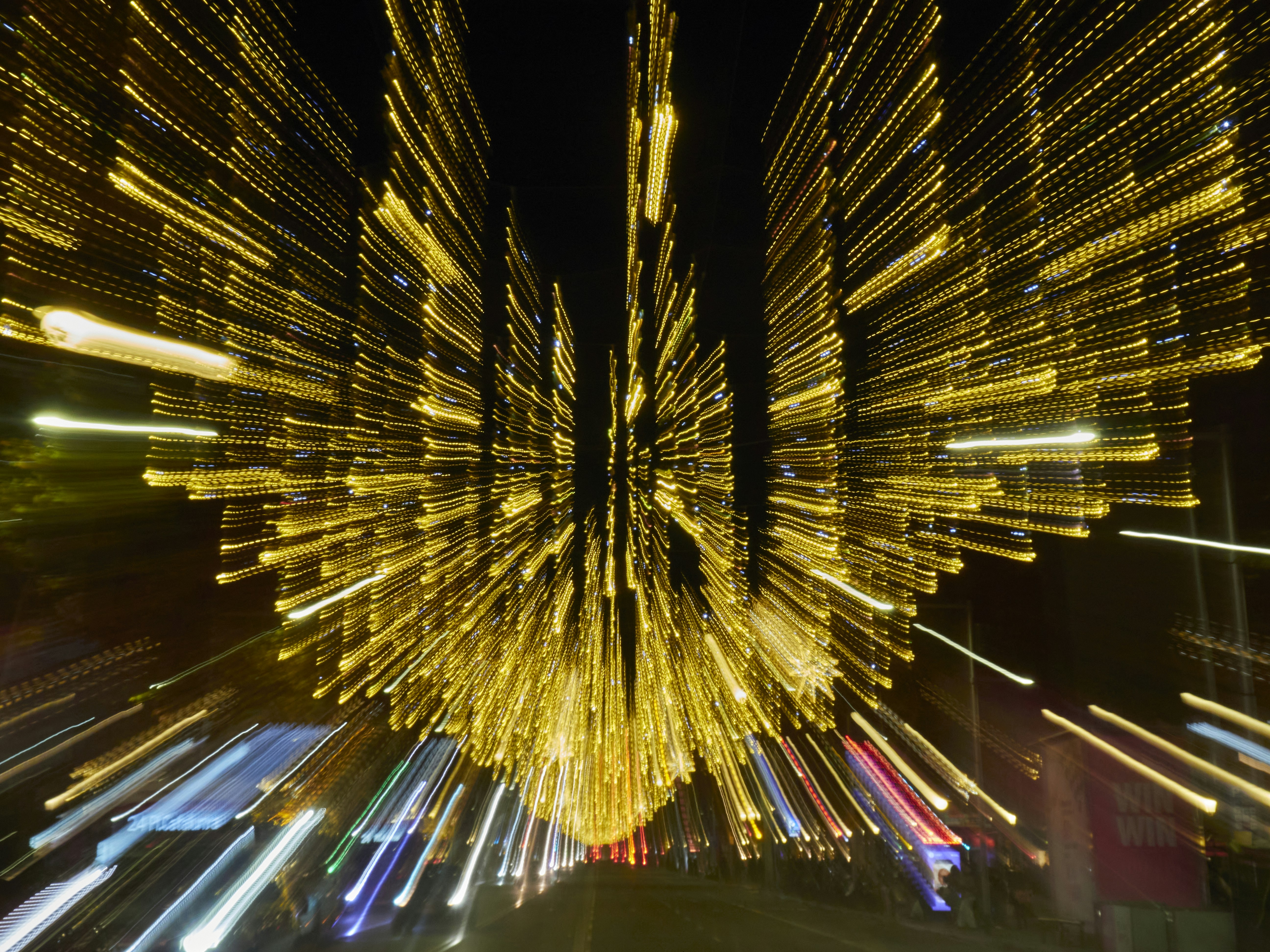 Abstract streaks of golden lights at night