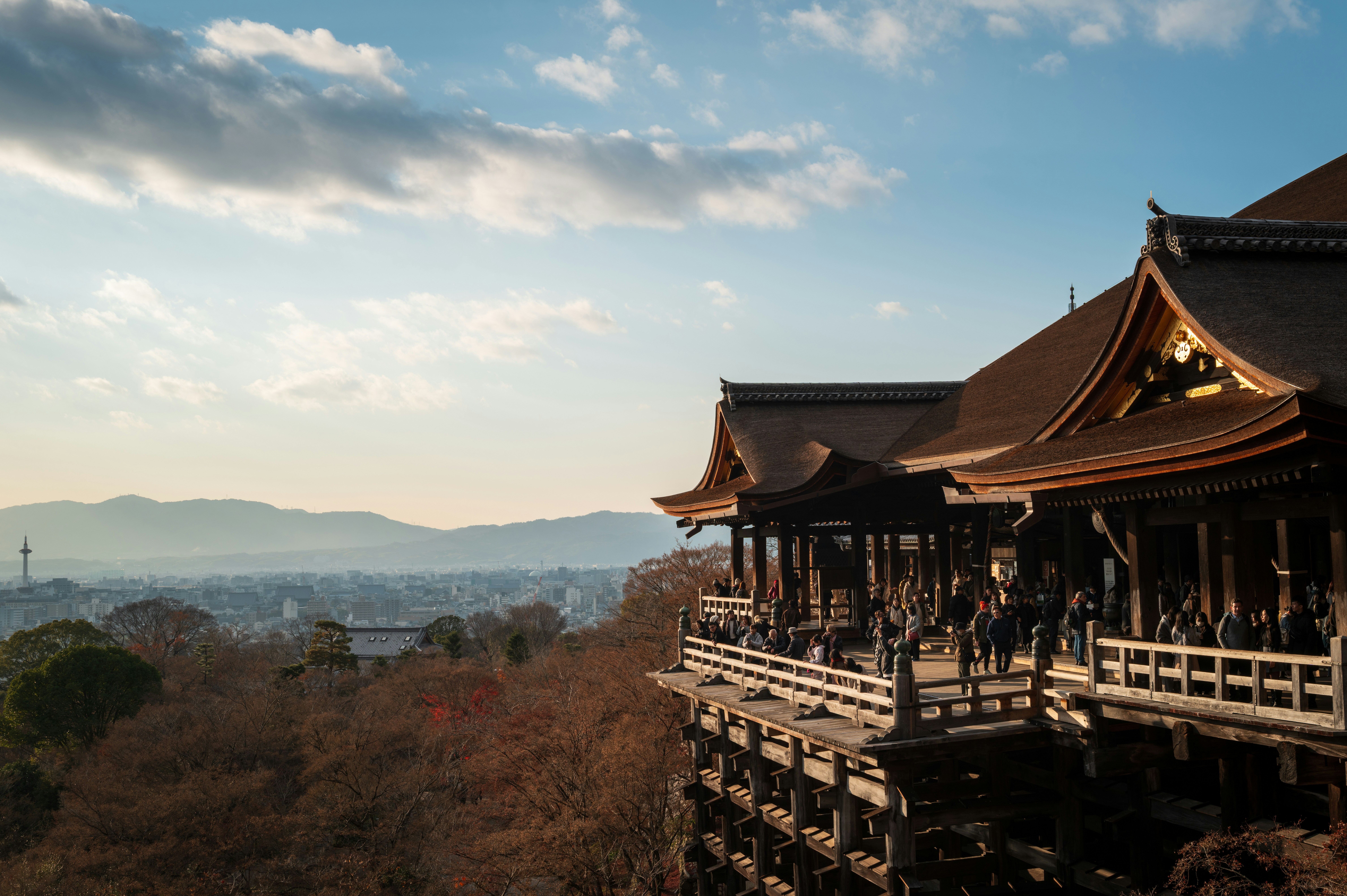 Traditional japanese temple building with scenic mountain view.