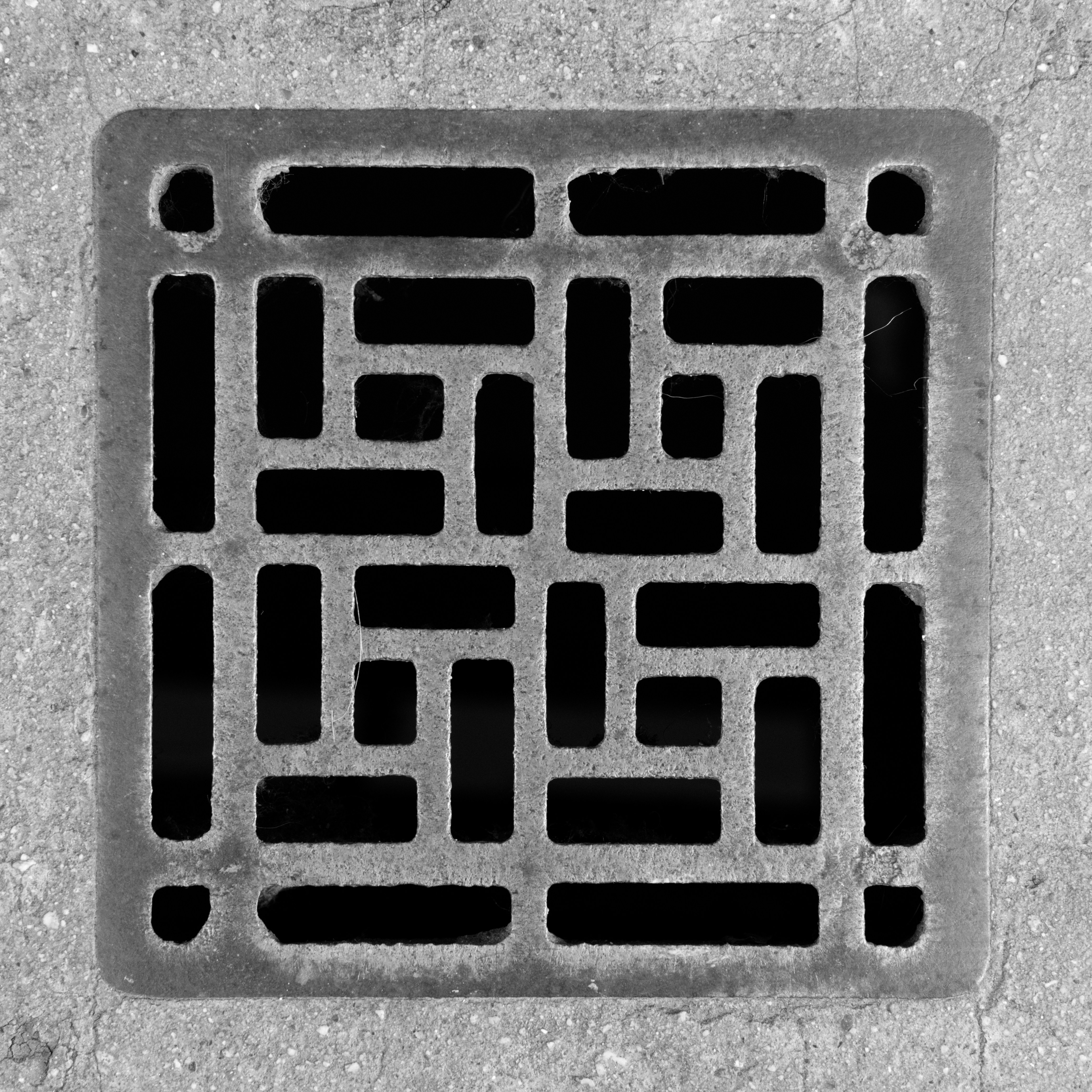 A square metal grate with a geometric pattern. photo – Free Background ...